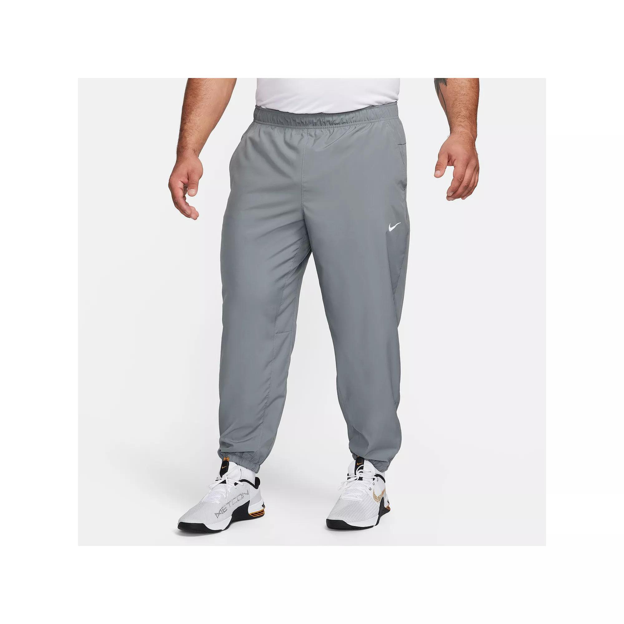 Nike Mens Form Dri-FIT Tapered Versatile Pants | FB7497-084 Product Image