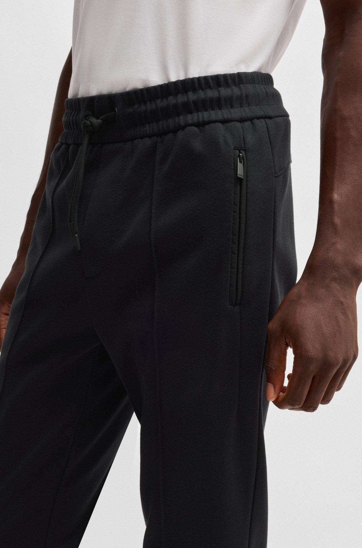 Regular-fit tracksuit bottoms in mercerized cotton Product Image