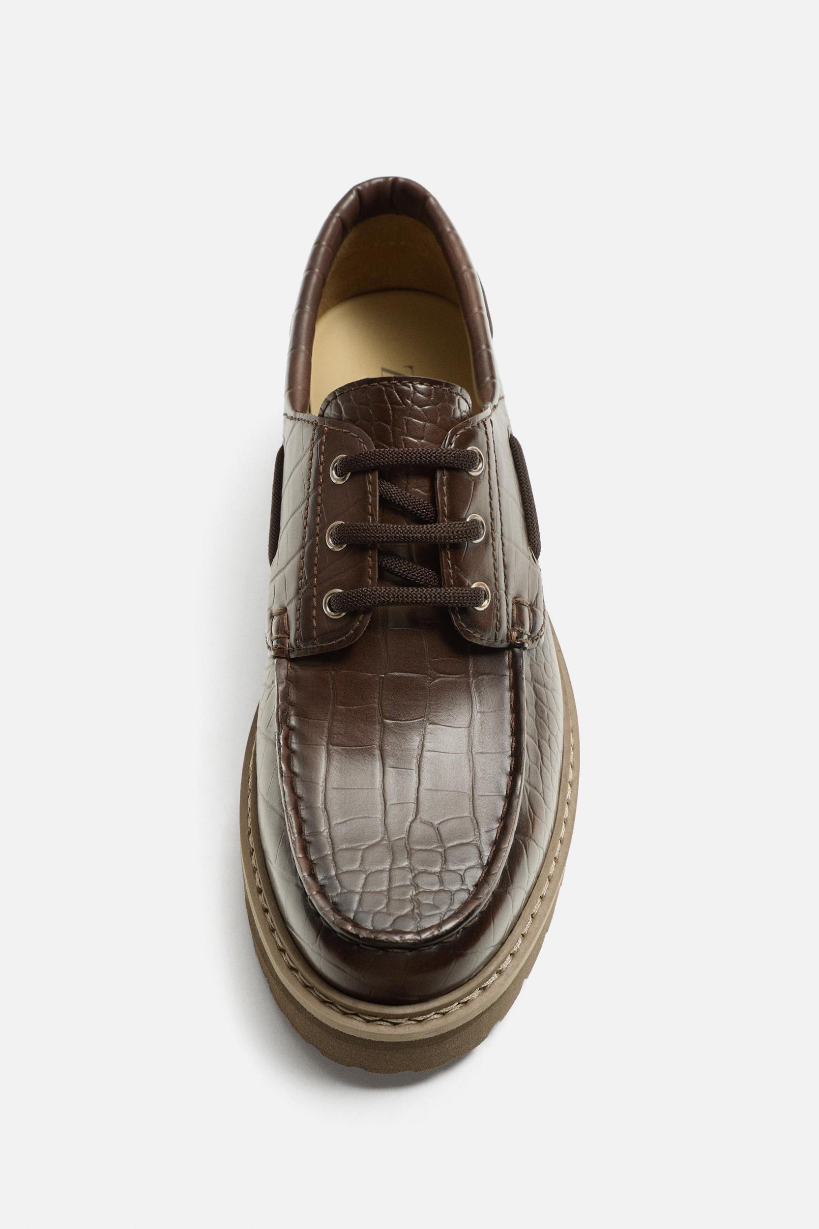 EMBOSSED BOAT SHOES Product Image
