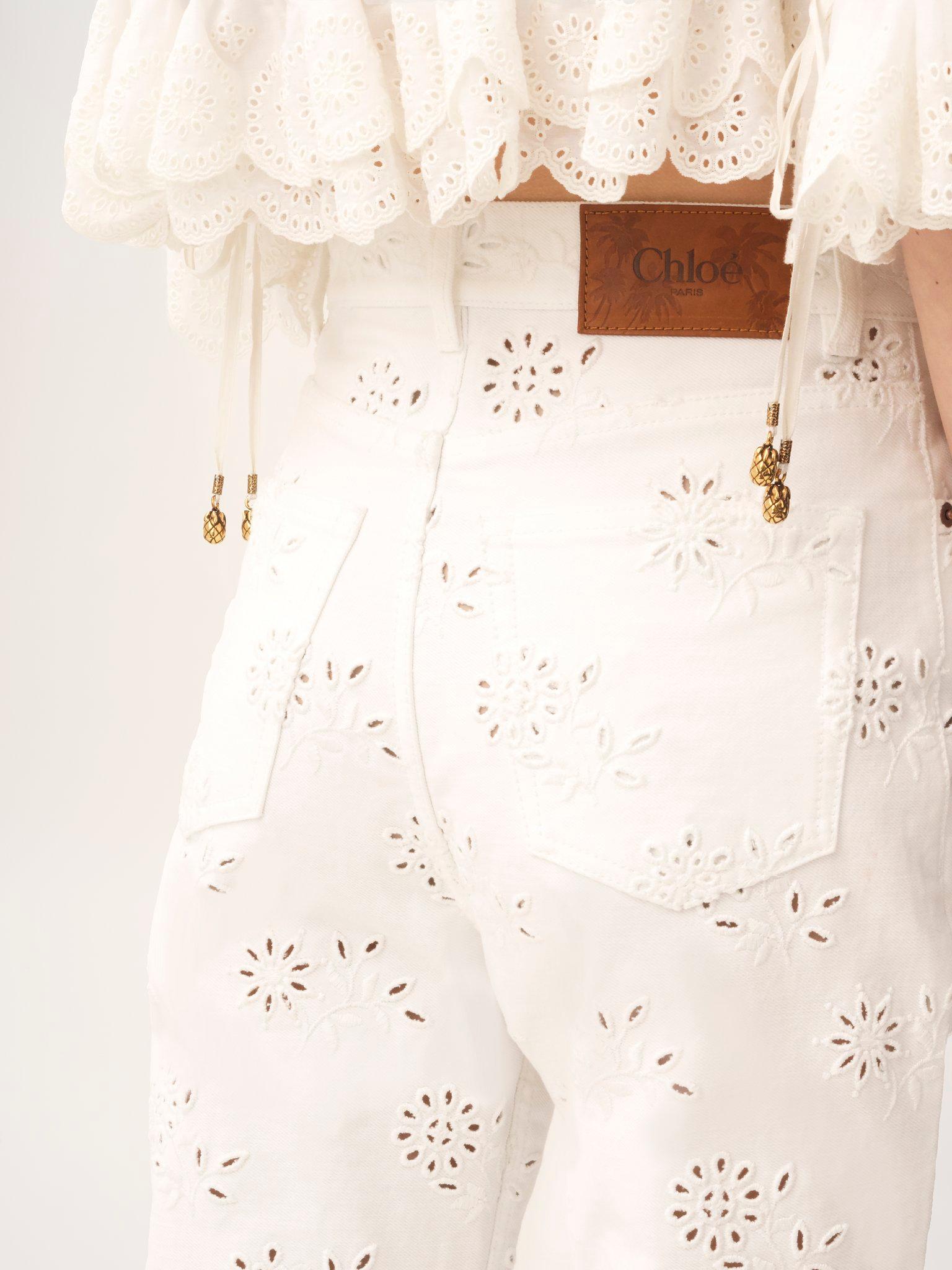 Embroidered cropped jeans in denim Product Image