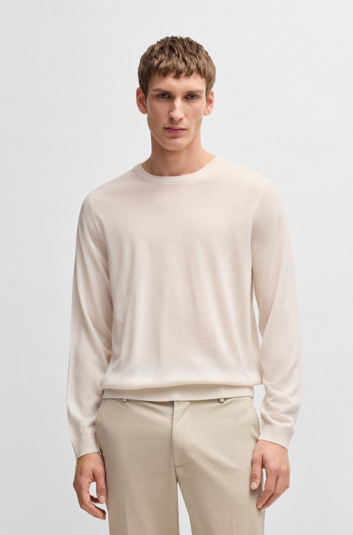 Slim-fit sweater in merino wool with crew neckline Product Image