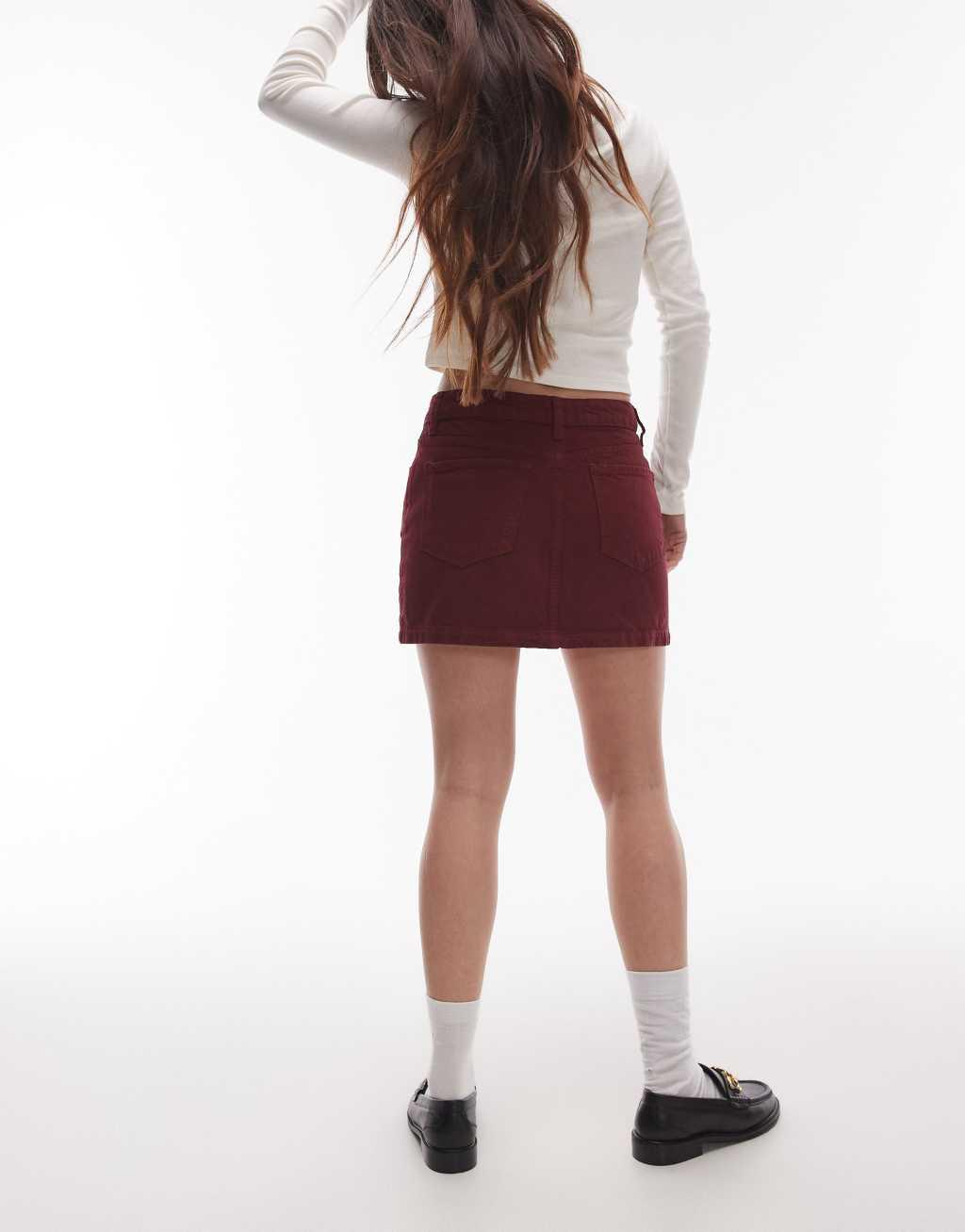Topshop denim mini pelmet skirt in burgundy Product Image