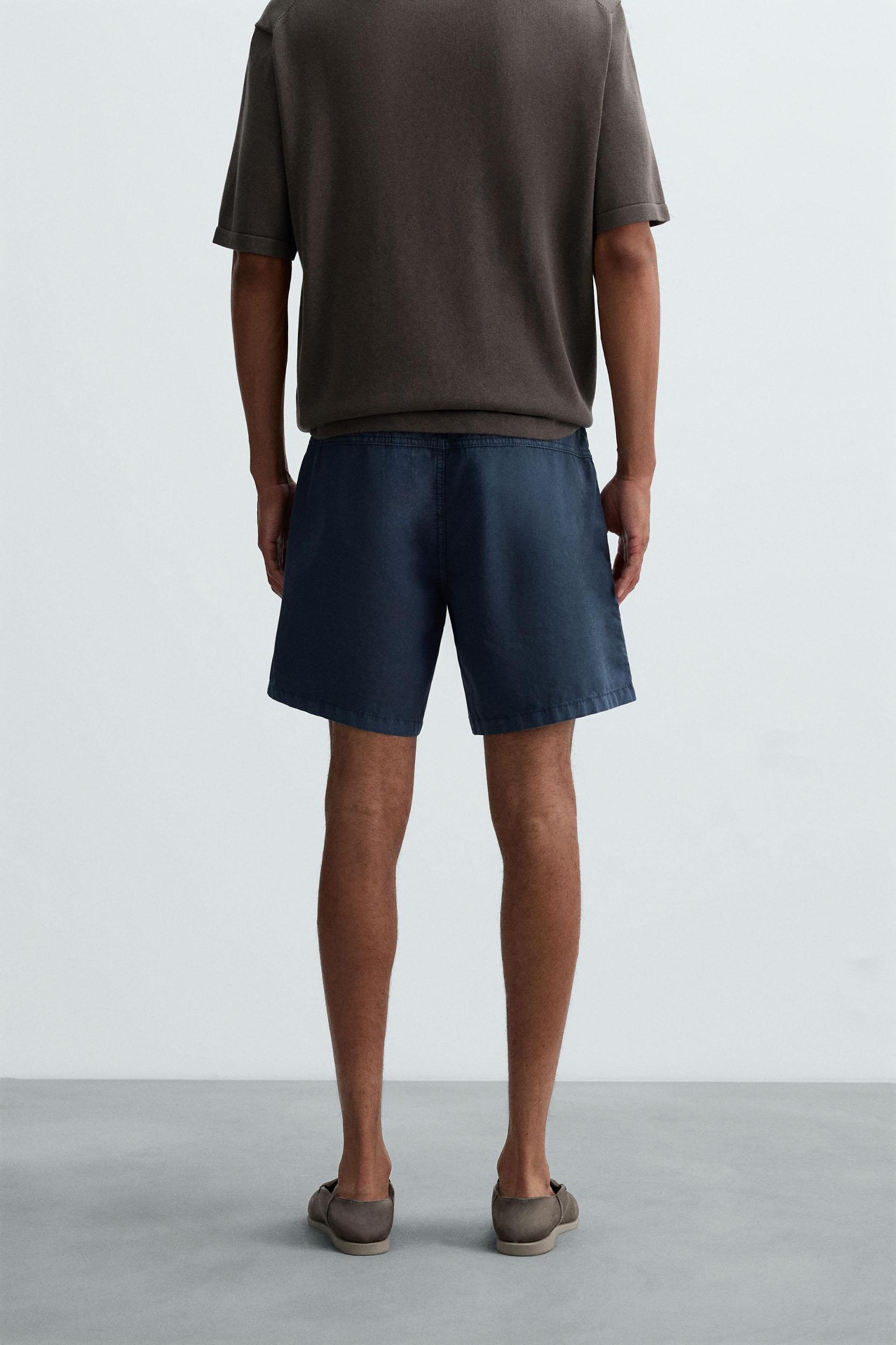 WASHED COTTON BERMUDA SHORTS Product Image