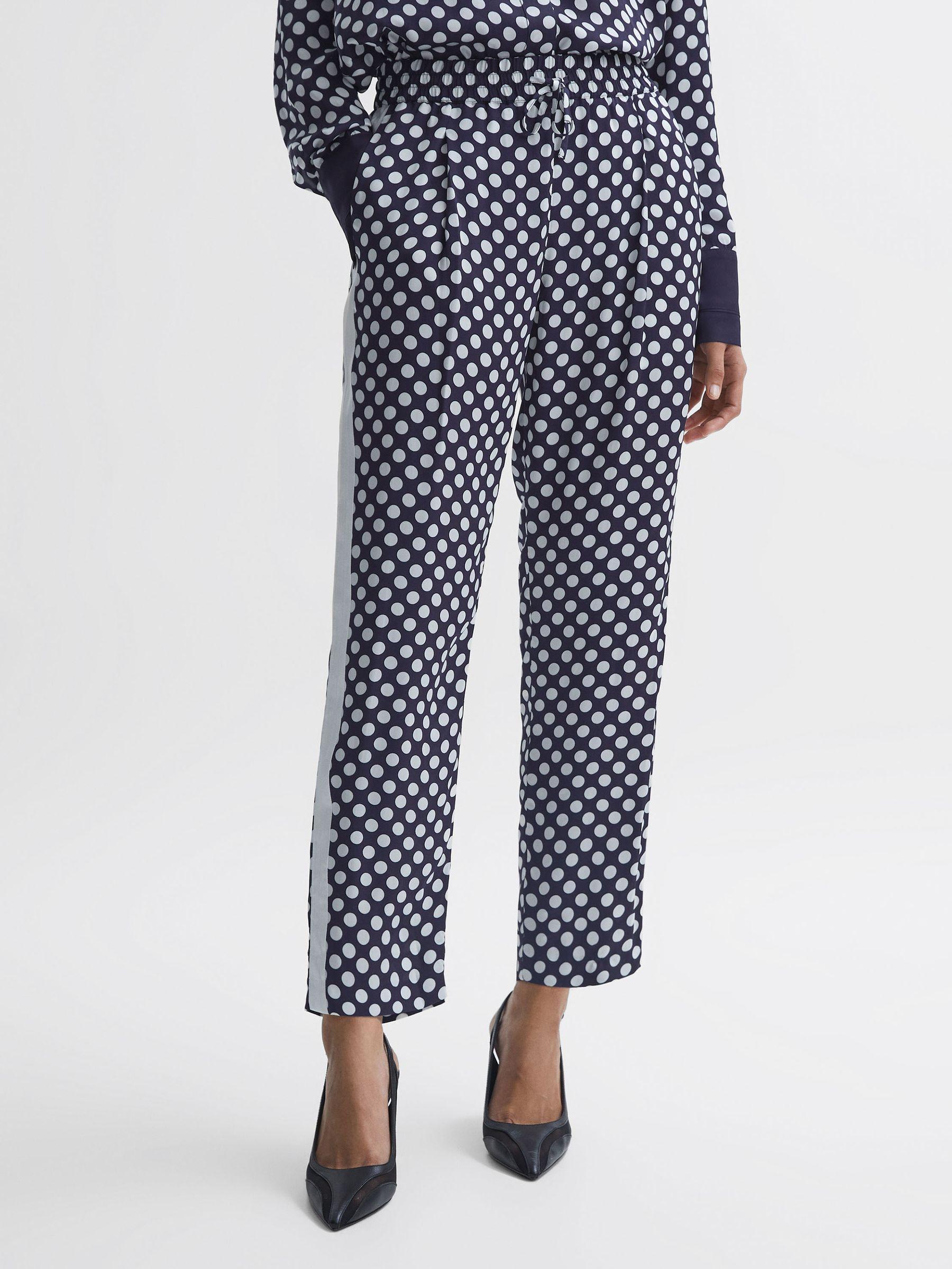 Polka Dot Drawstring Tapered Trousers in Navy/White Product Image