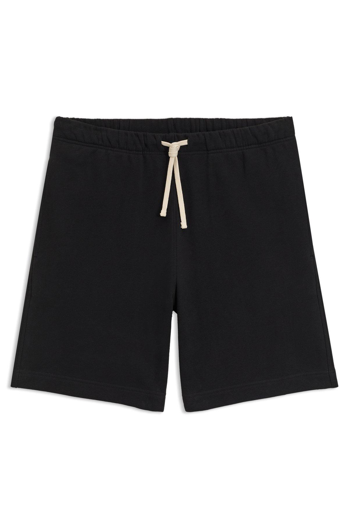 BOSS - BECKHAM x BOSS oversized-fit shorts in cotton terry - Black Product Image
