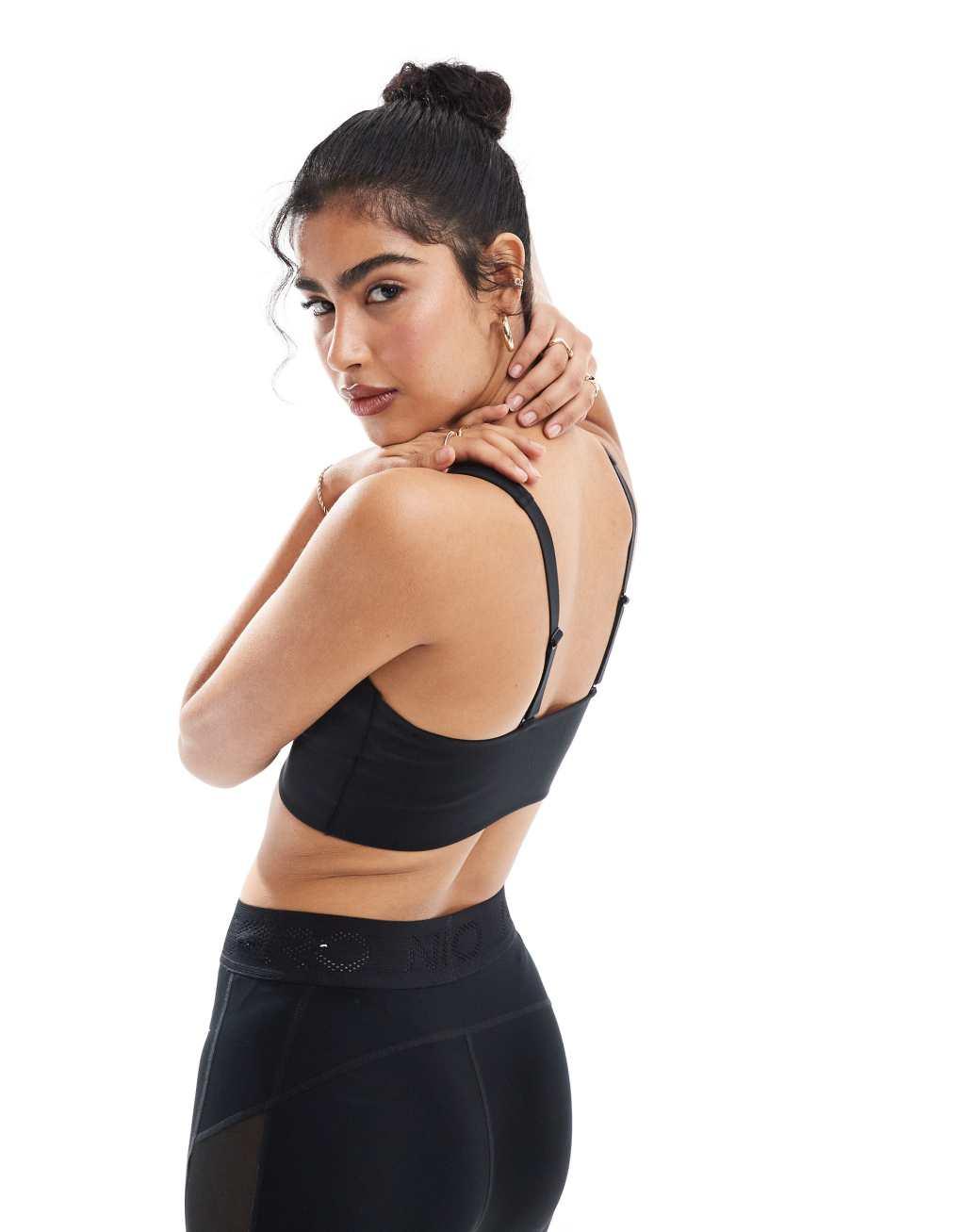Nike Training Alate longline medium support sports bra in black Product Image
