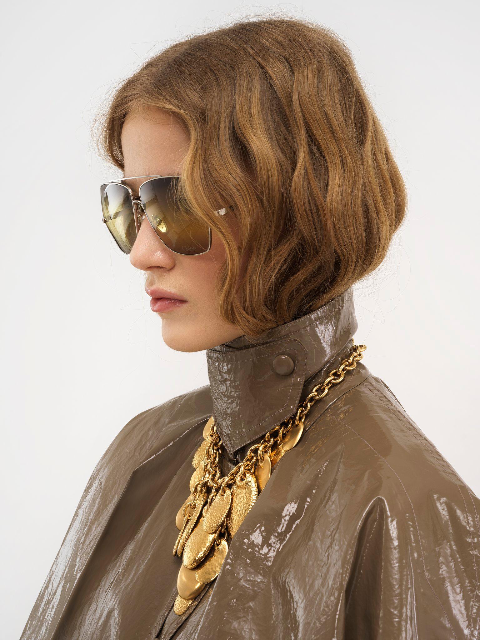 Short cape in lacquered shiny cotton Product Image