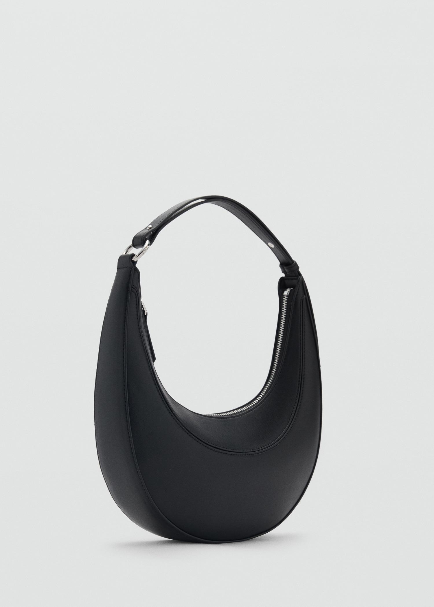 Oval shoulder bag - Women | MANGO USA Product Image