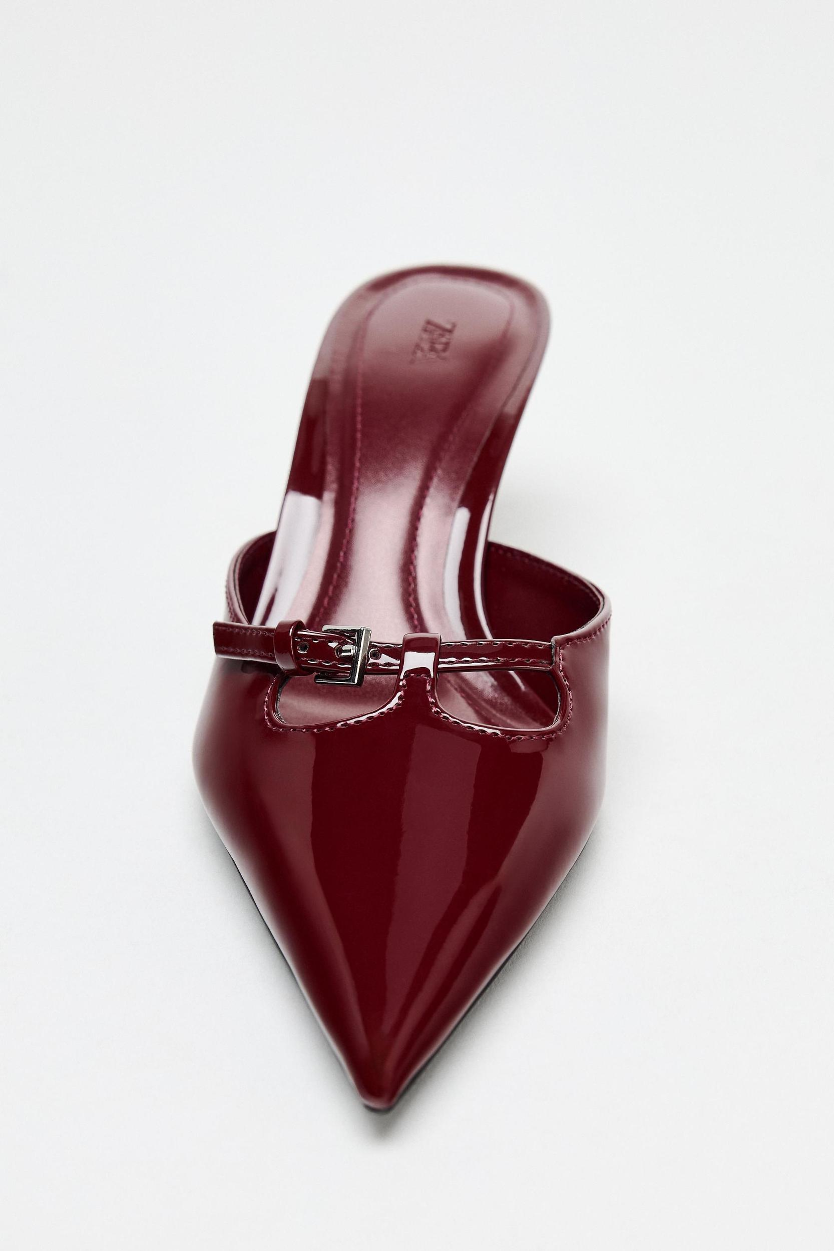 PATENT FINISH BUCKLED MULES Product Image