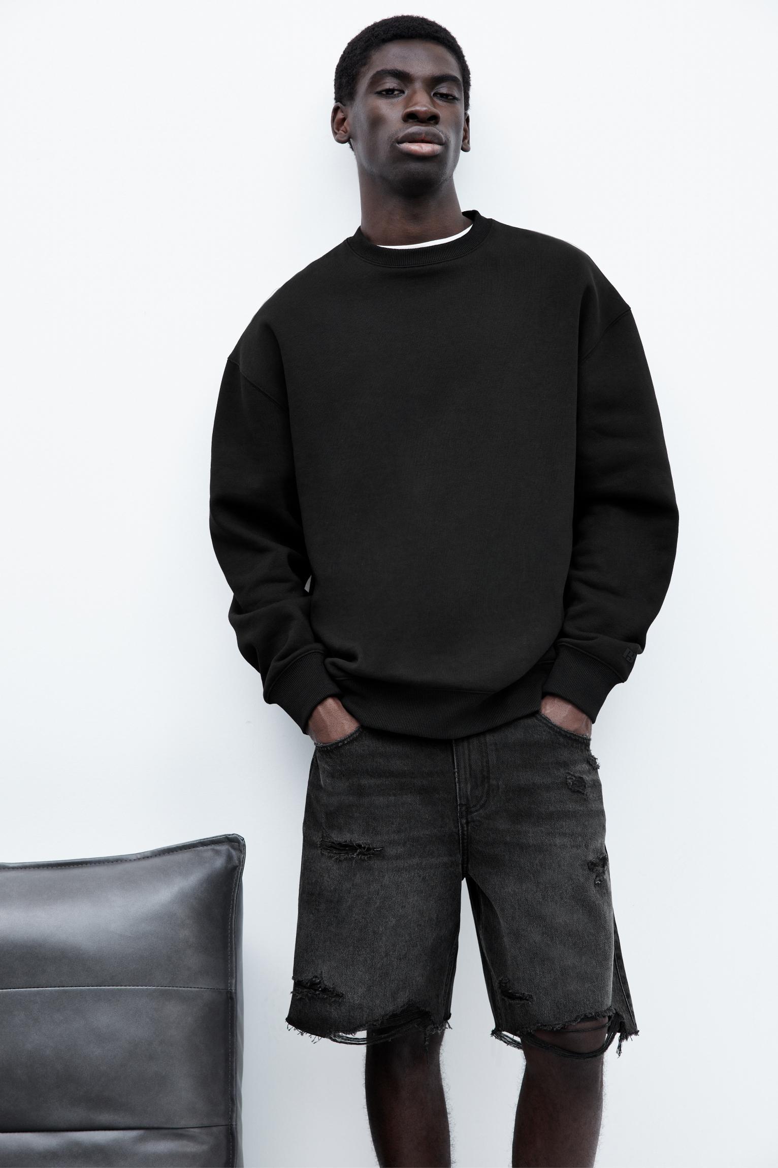 Ripped straight fit denim Bermuda shorts Product Image