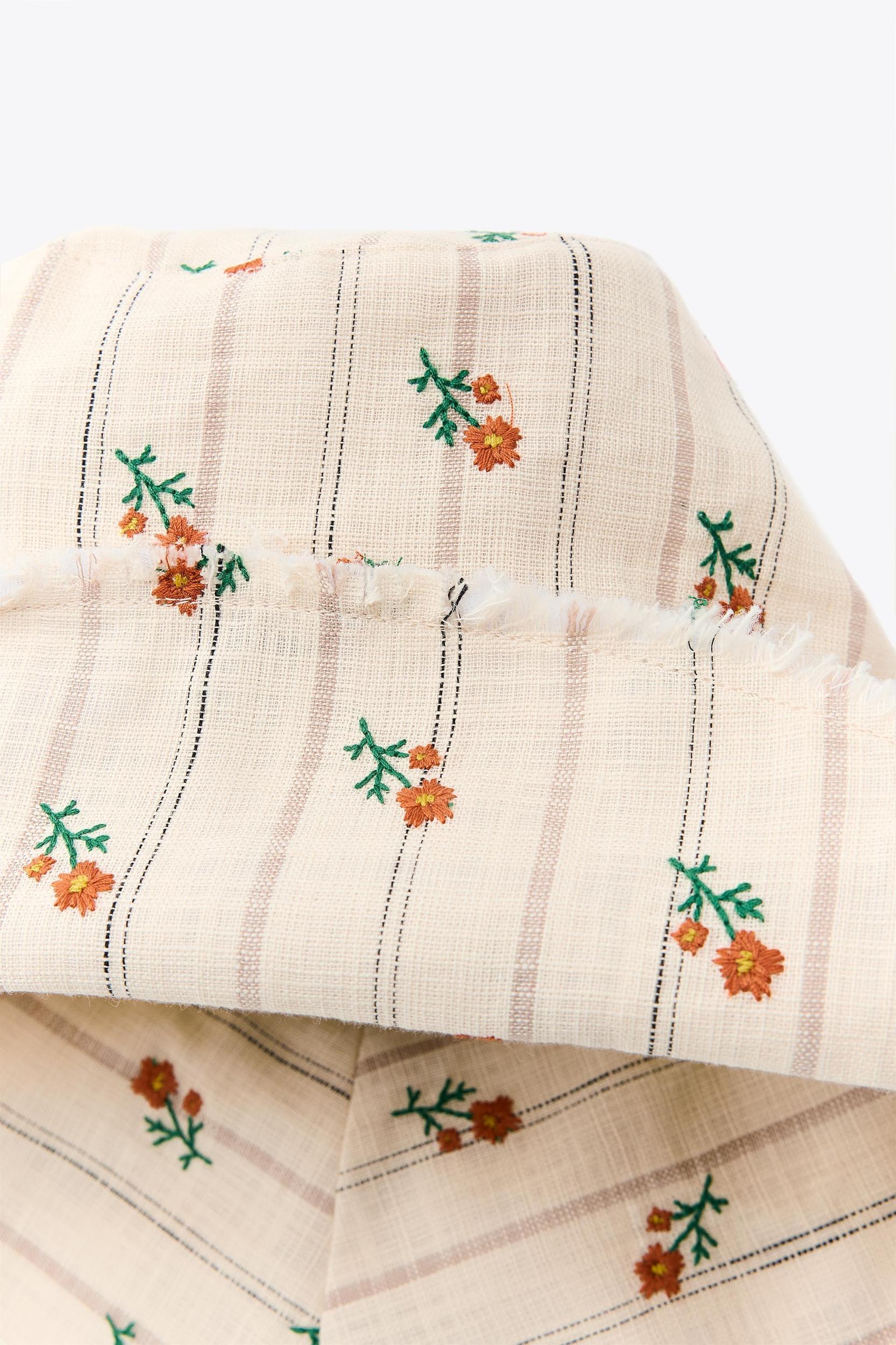 STRIPED FLORAL BUCKET HAT Product Image