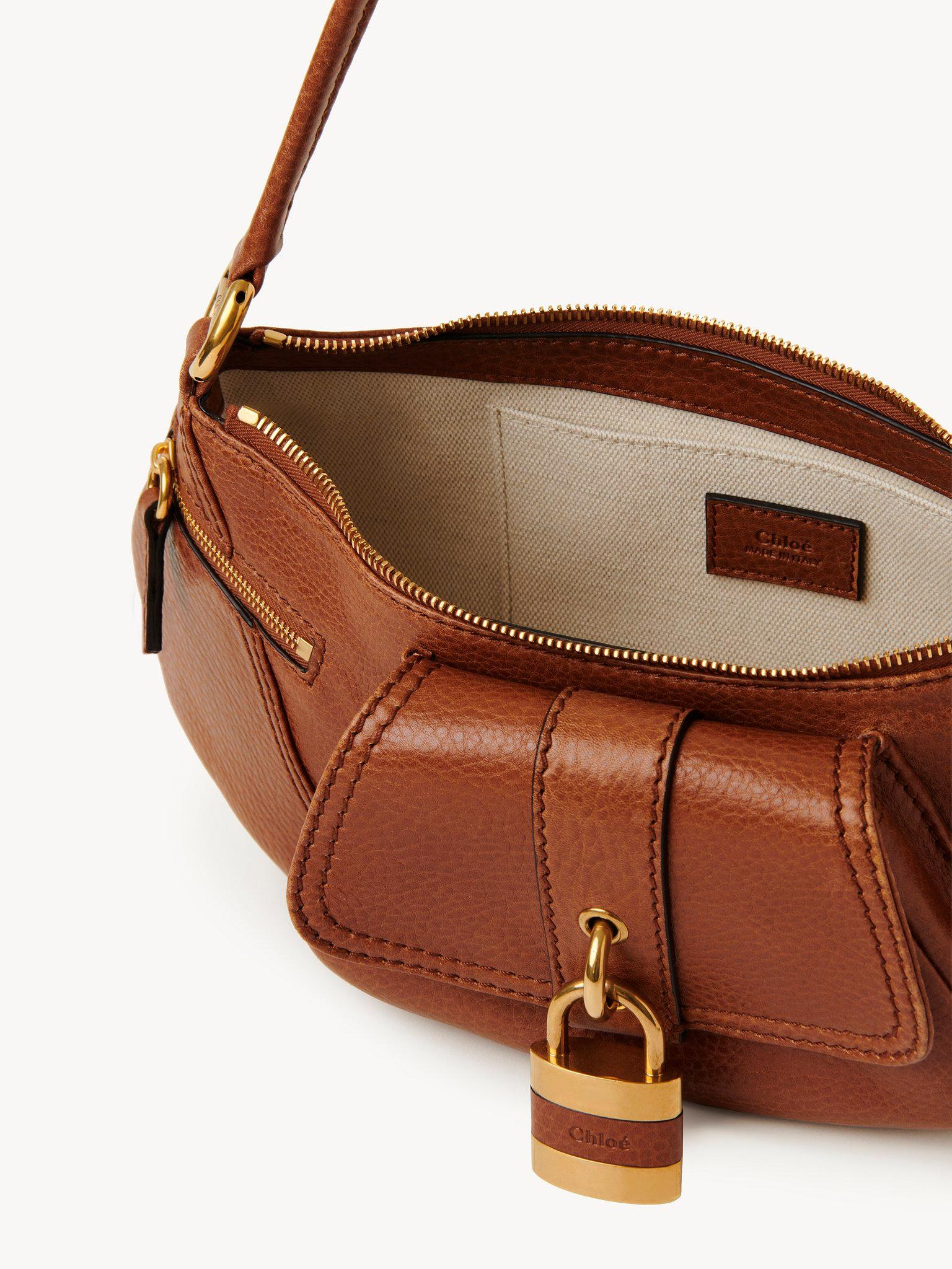 The 99 shoulder bag in grained leather Product Image
