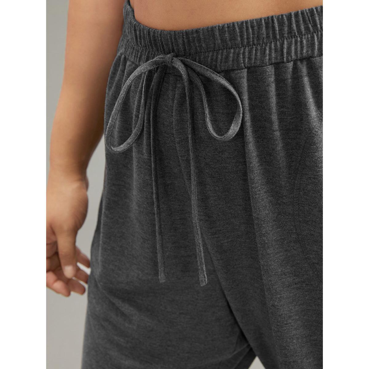 Plus Size Solid Pocket Knotted Flare Leg Pants Women Gray Casual Flare Leg High Rise Dailywear Pants BloomChic 10/M Product Image