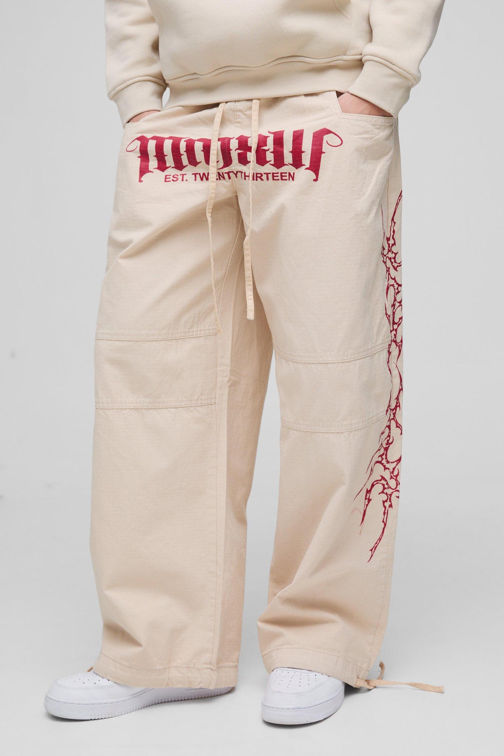 Elasticated Waist Parachute Acid Wash Ripstop Printed Pants | boohooMAN USA Product Image