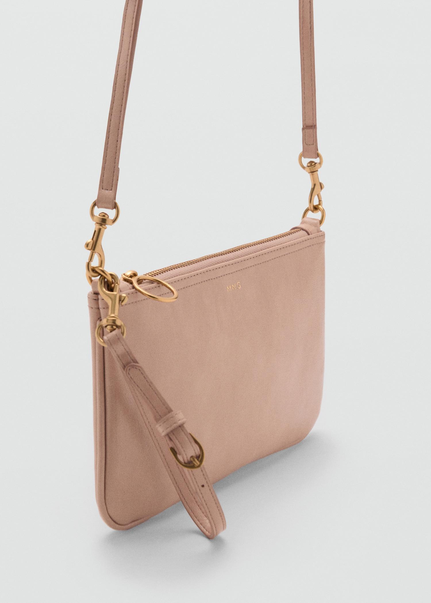 Tumbled leather-effect clutch - Women | MANGO USA Product Image