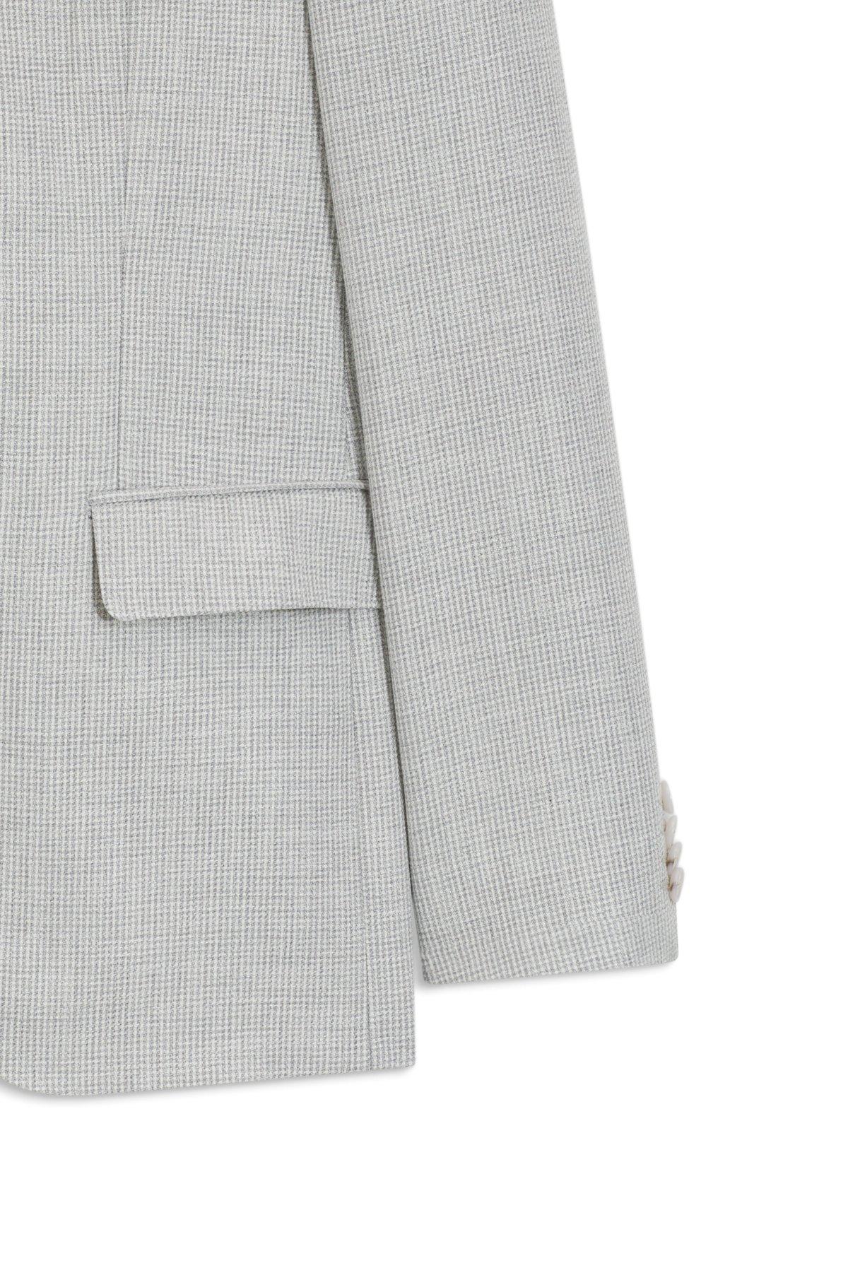 Two-piece slim-fit suit in cotton and virgin wool Product Image