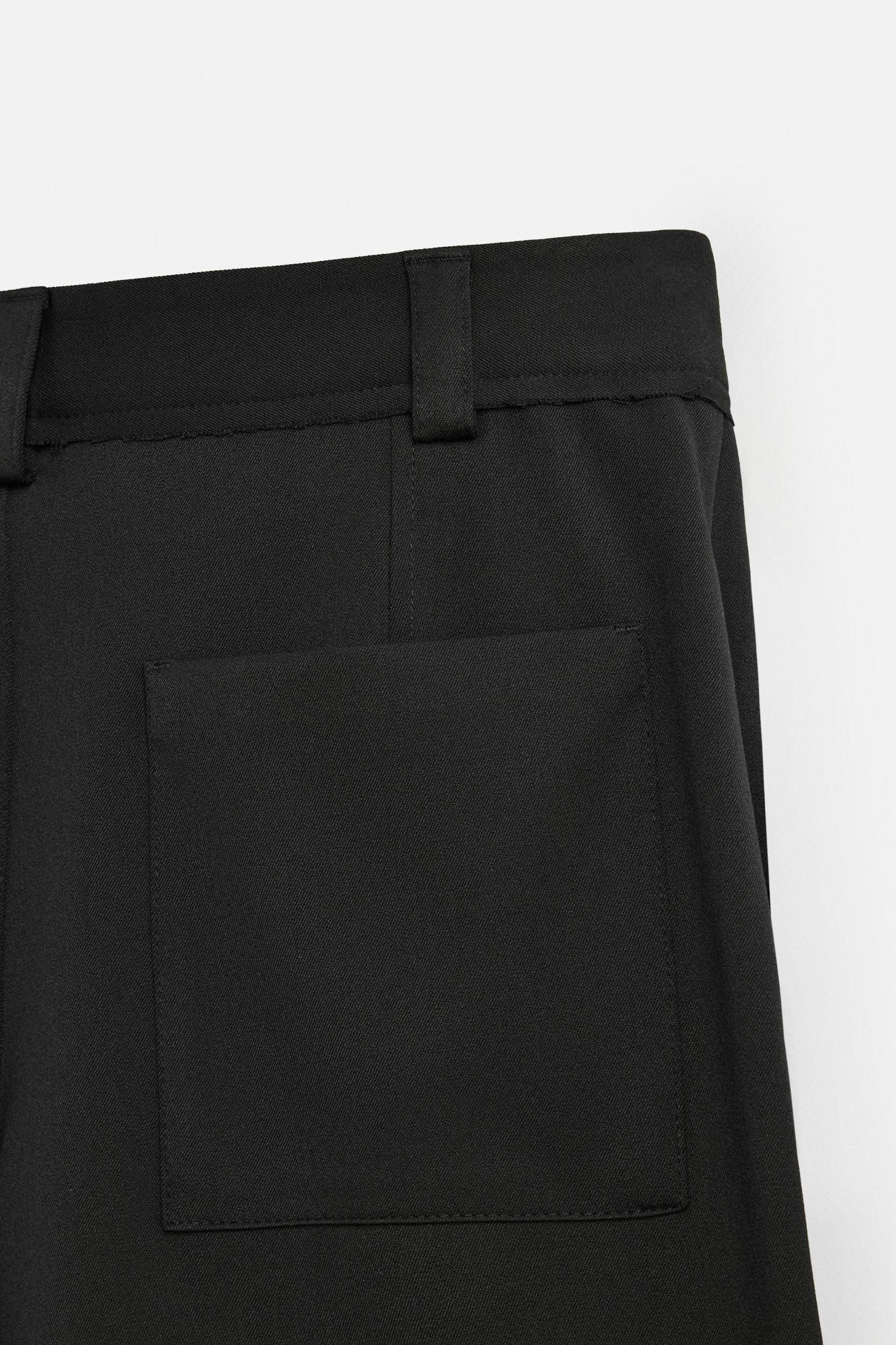 TEXTURED PLEATED SHORTS Product Image