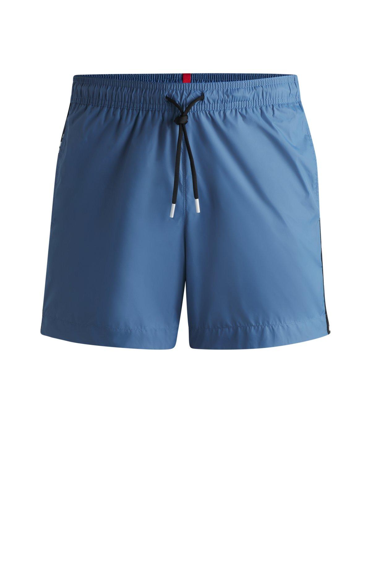 Fully lined swim shorts with logo tape Product Image