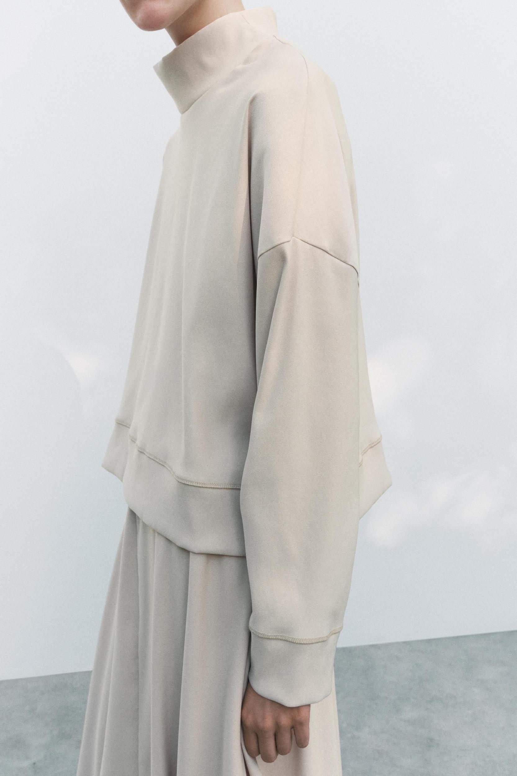 ZIPPERED VOLUMINOUS TOP Product Image