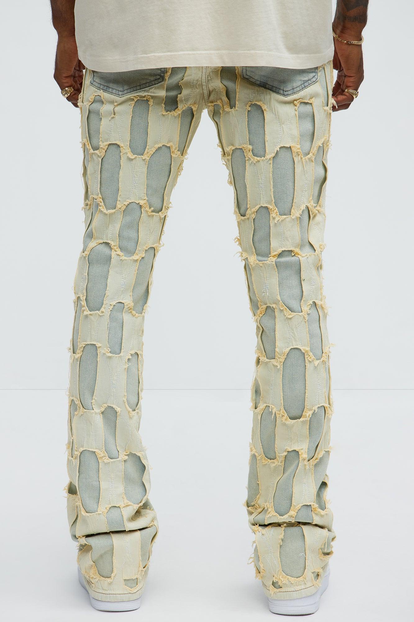 Shredded Distressed Stacked Skinny Flare Jeans - Medium Wash Product Image