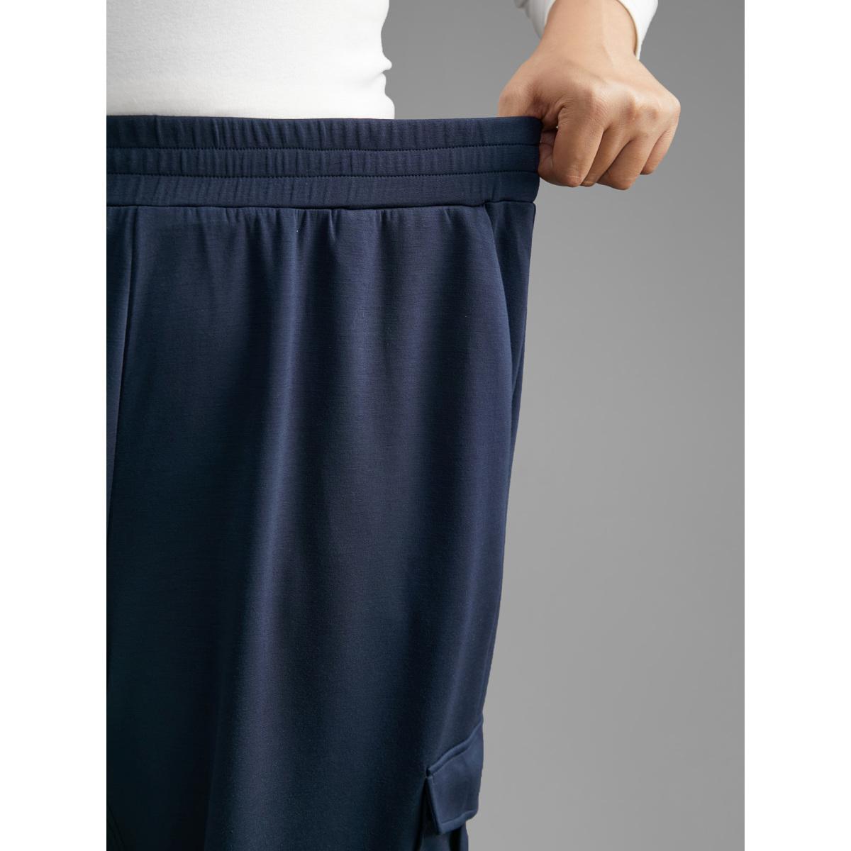 Plus Size Mid Rise Patched Pocket Carrot Pants Women Indigo Casual Loose Mid Rise Everyday Pants BloomChic 12/L Product Image