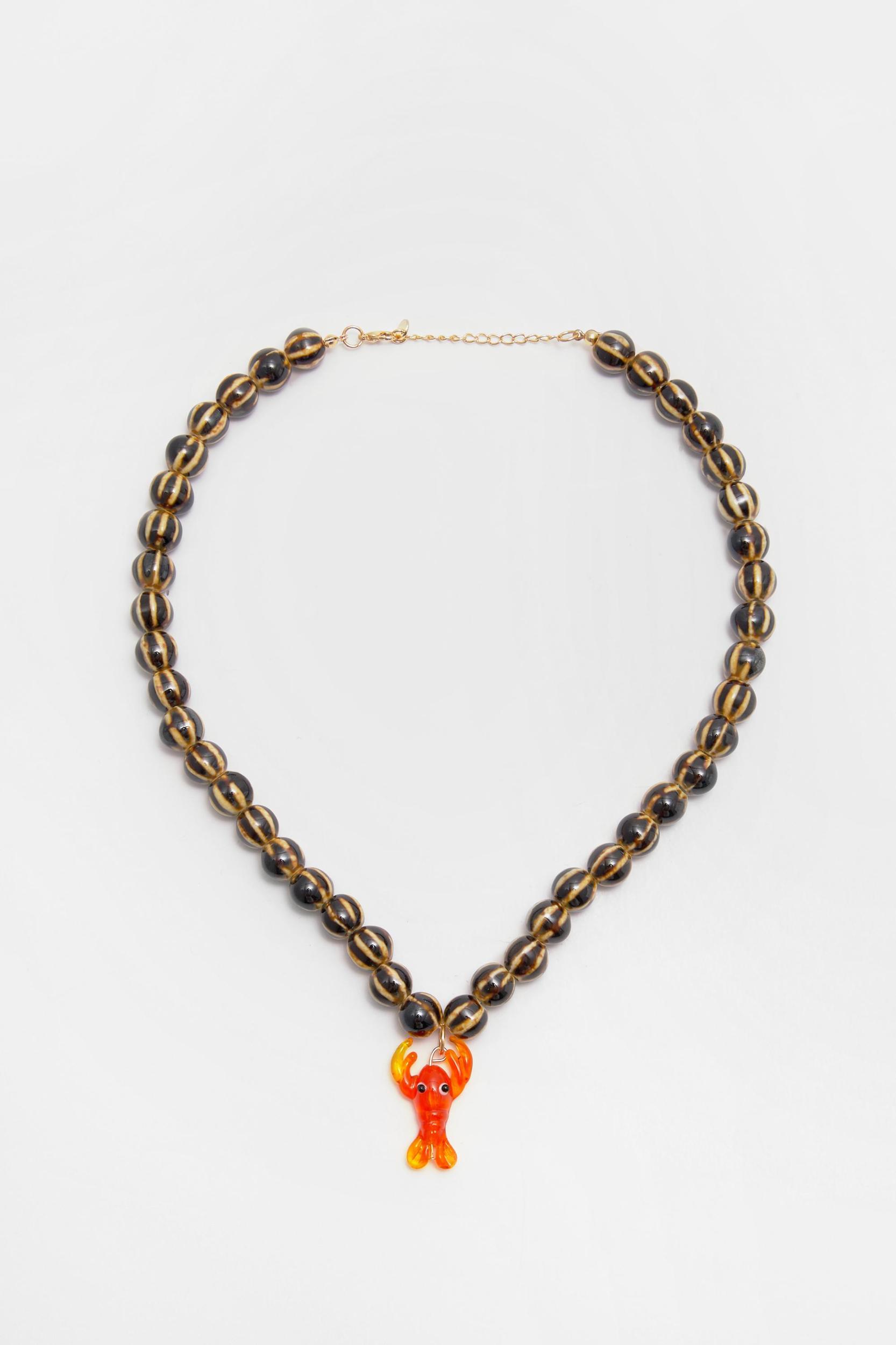 Beaded necklace with lobster pendant Product Image