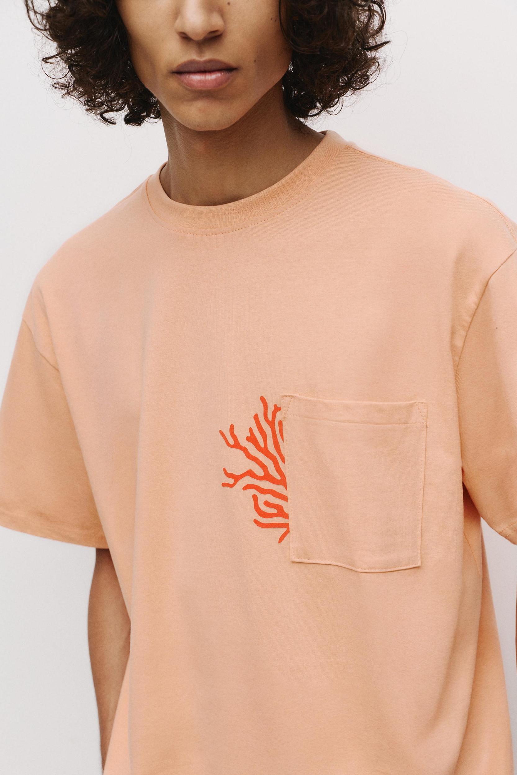 Orange T-shirt with pocket Product Image