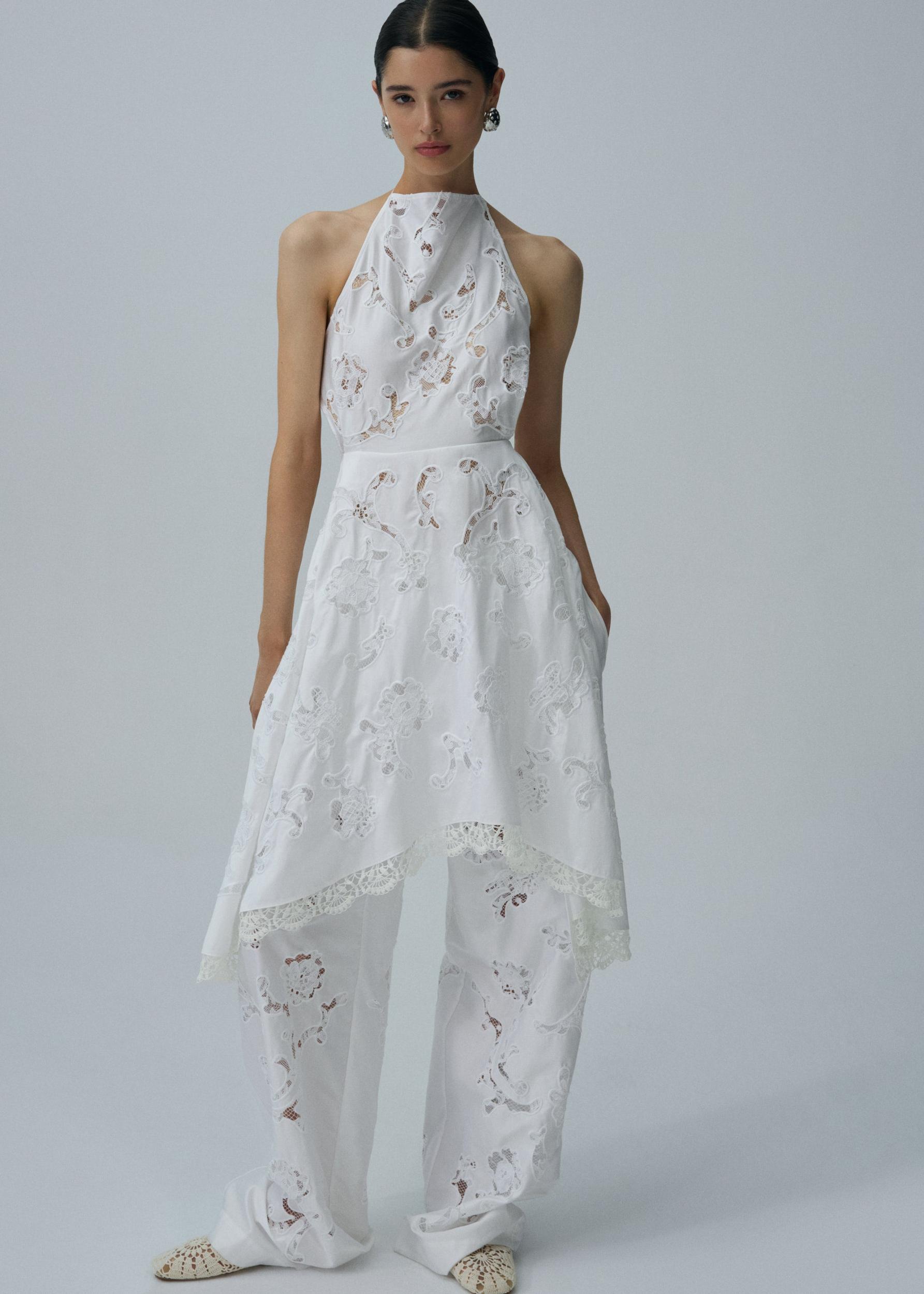 Elastic waistband trousers in white Product Image