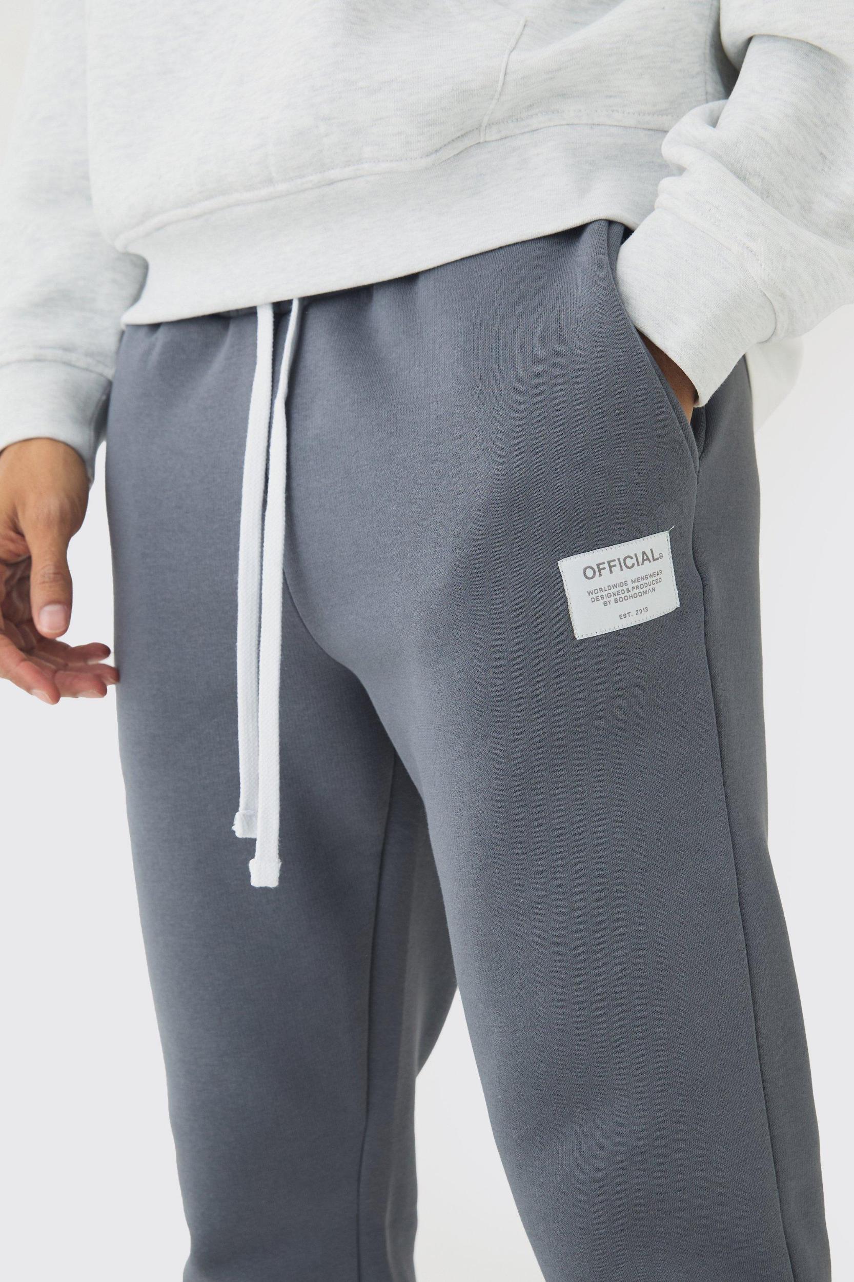 Slim Fit Flare Stacked Woven Tab Gusset Sweatpants | boohooMAN USA Product Image