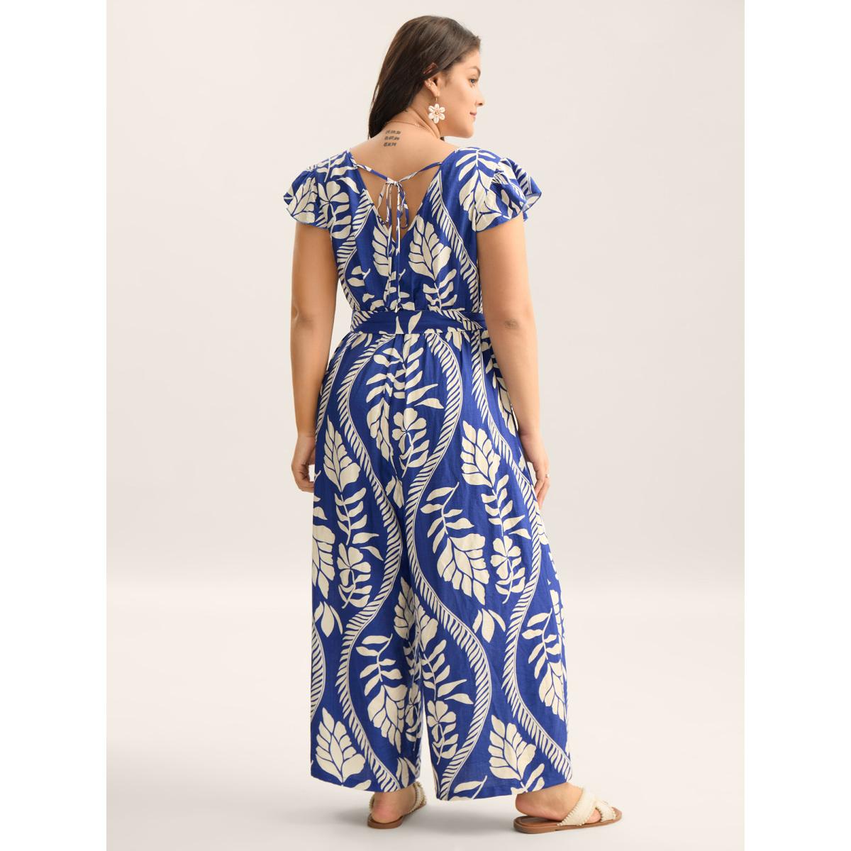 Plus Size Navy Large Floral Print Pockets Jumpsuit Women Resort Cap Sleeve Overlap Collar Vacation Loose Jumpsuits BloomChic 22-24/3X Product Image