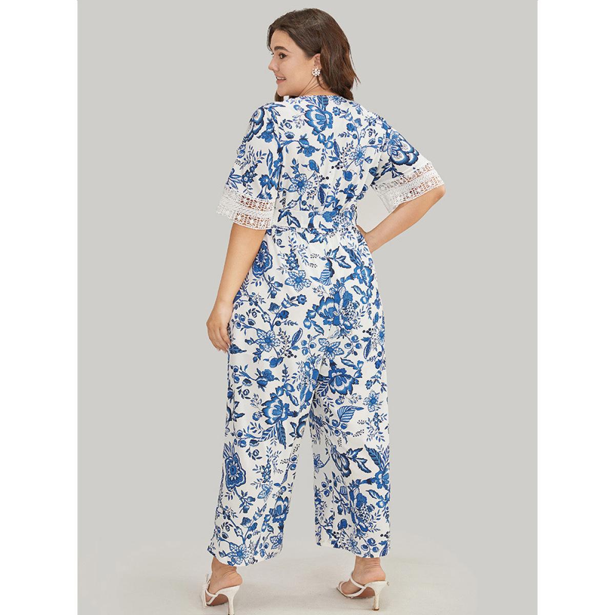 Plus Size Navy Floral Belted Pocket Lace Trim Wrap Jumpsuit Women Vacation Short sleeve V-neck Dailywear Loose Jumpsuits BloomChic 26/4X Product Image