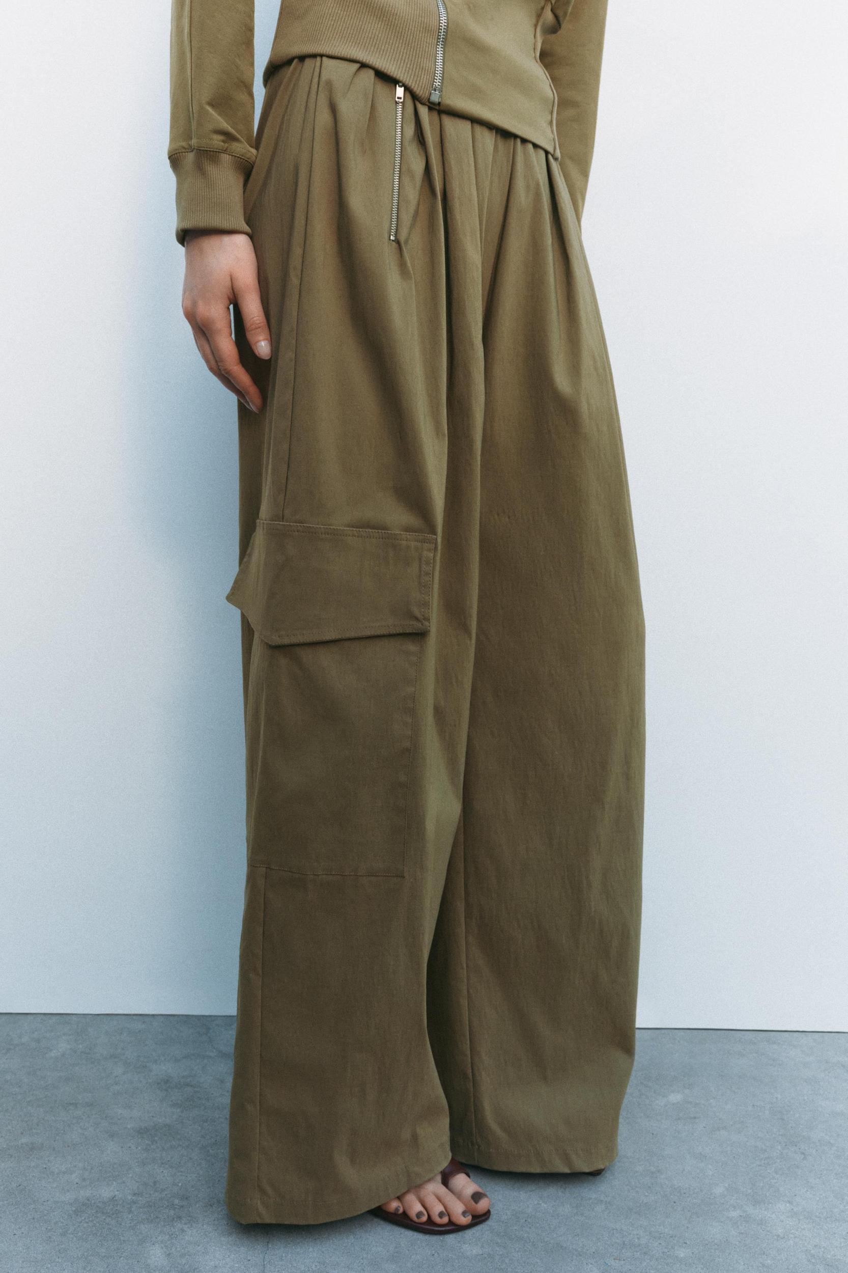 PLEATED RELAXED FIT PANTS Product Image
