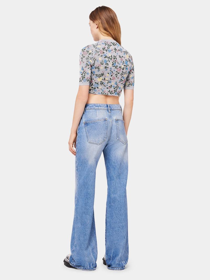 Flared jeans embellished with 1969 discs Product Image