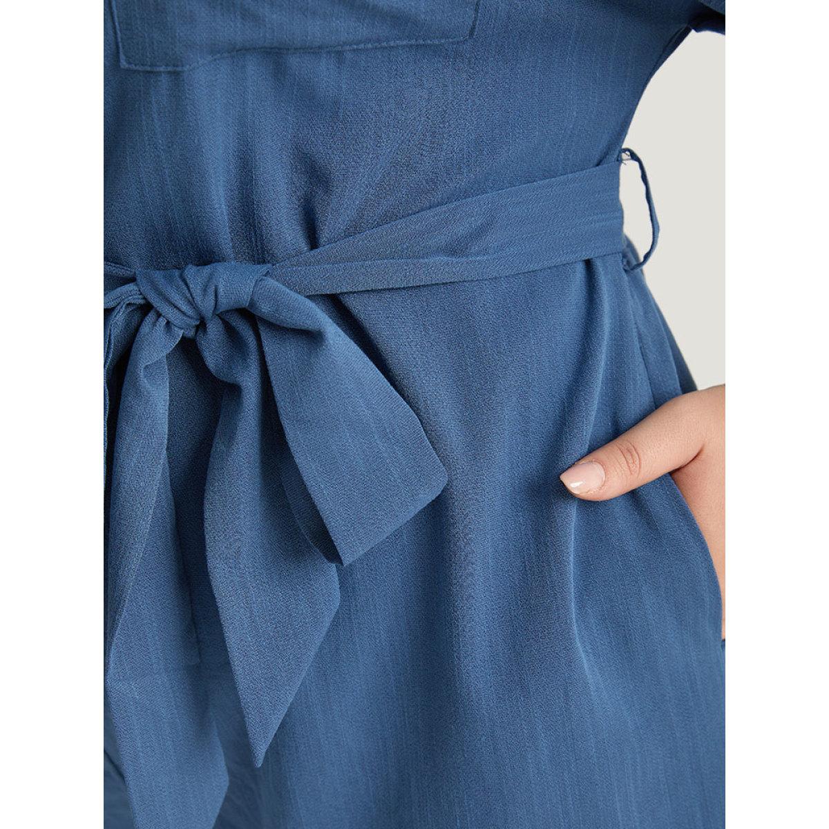 Plus Size Stone Anti-Wrinkle Solid Patched Pocket Notched Button Up Belt Romper Women Office Short sleeve Notched collar Office Loose Jumpsuits BloomChic 18-20/2X Product Image