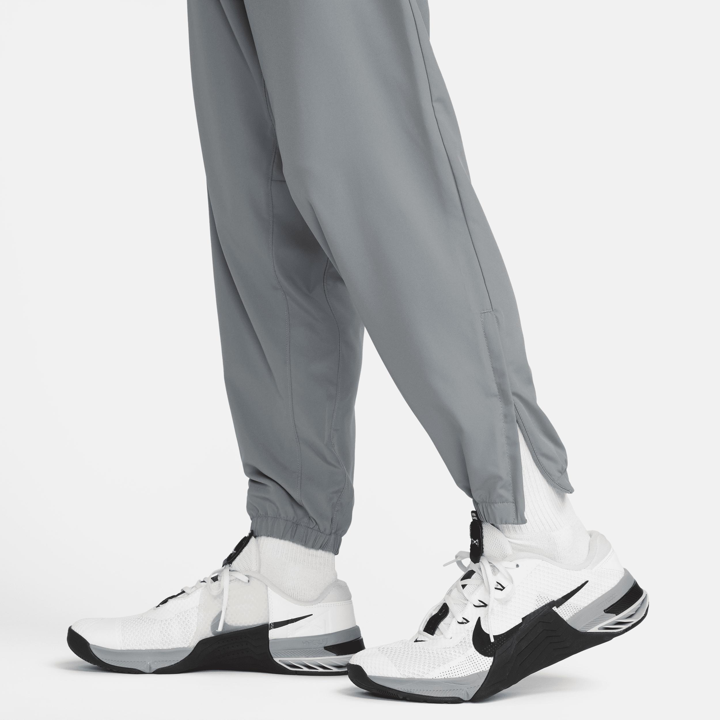 Nike Mens Form Dri-FIT Tapered Versatile Pants | FB7497-084 Product Image