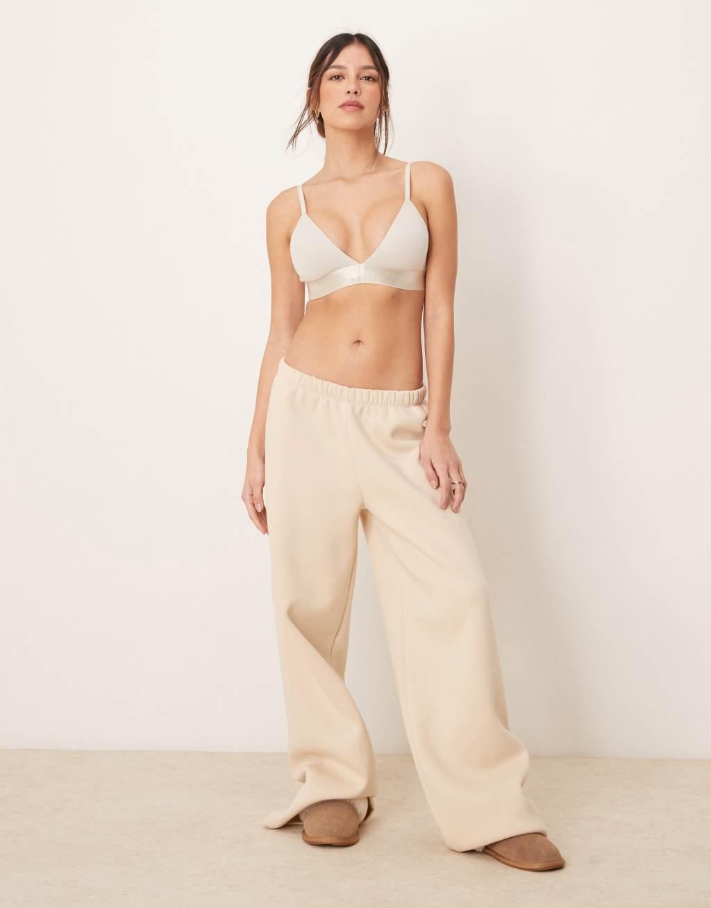 Calvin Klein Modern Cotton unlined triangle bralette with metallic logo taping in cream Product Image