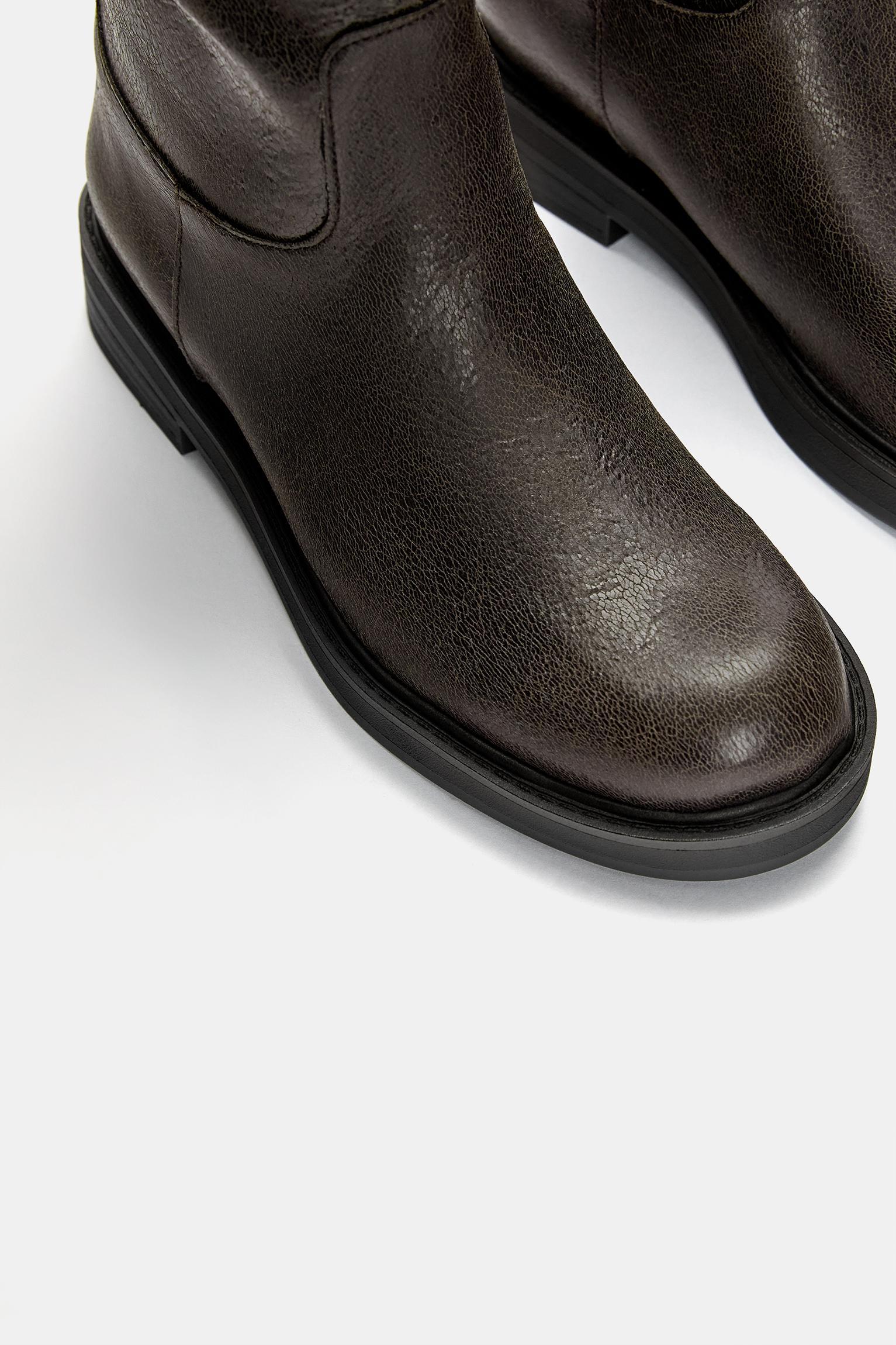 Flat knee-high boots with buckle Product Image