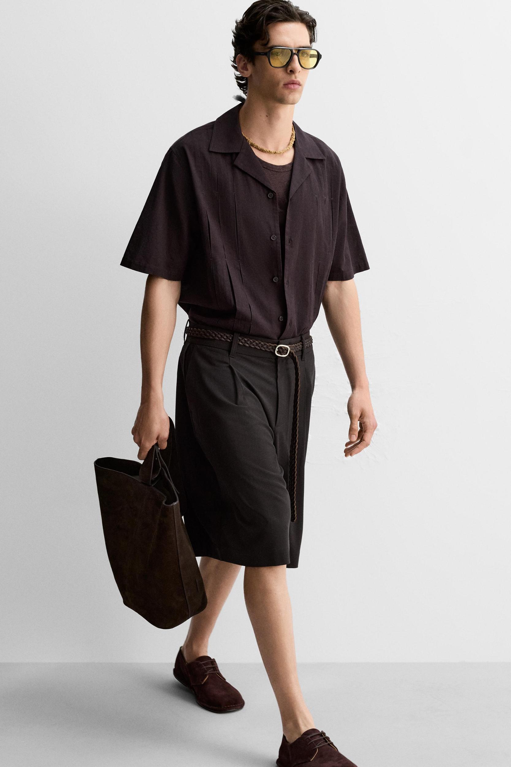 RELAXED FIT PLEATED SHORTS Product Image