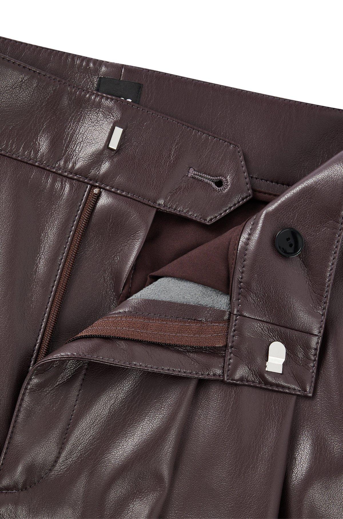 Pleat-front relaxed-fit trousers in faux leather Product Image