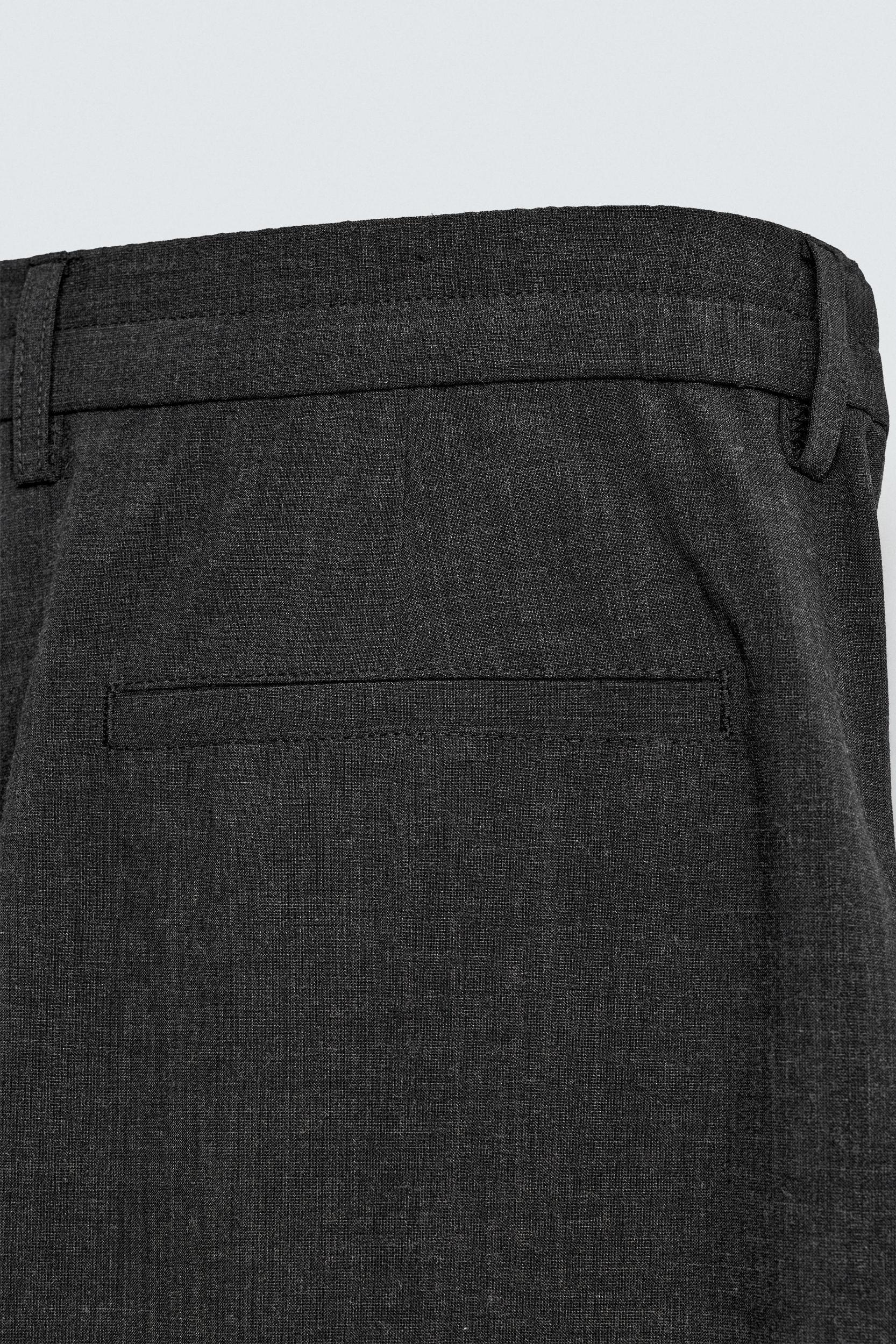 PLEATED WIDE FIT PANTS Product Image