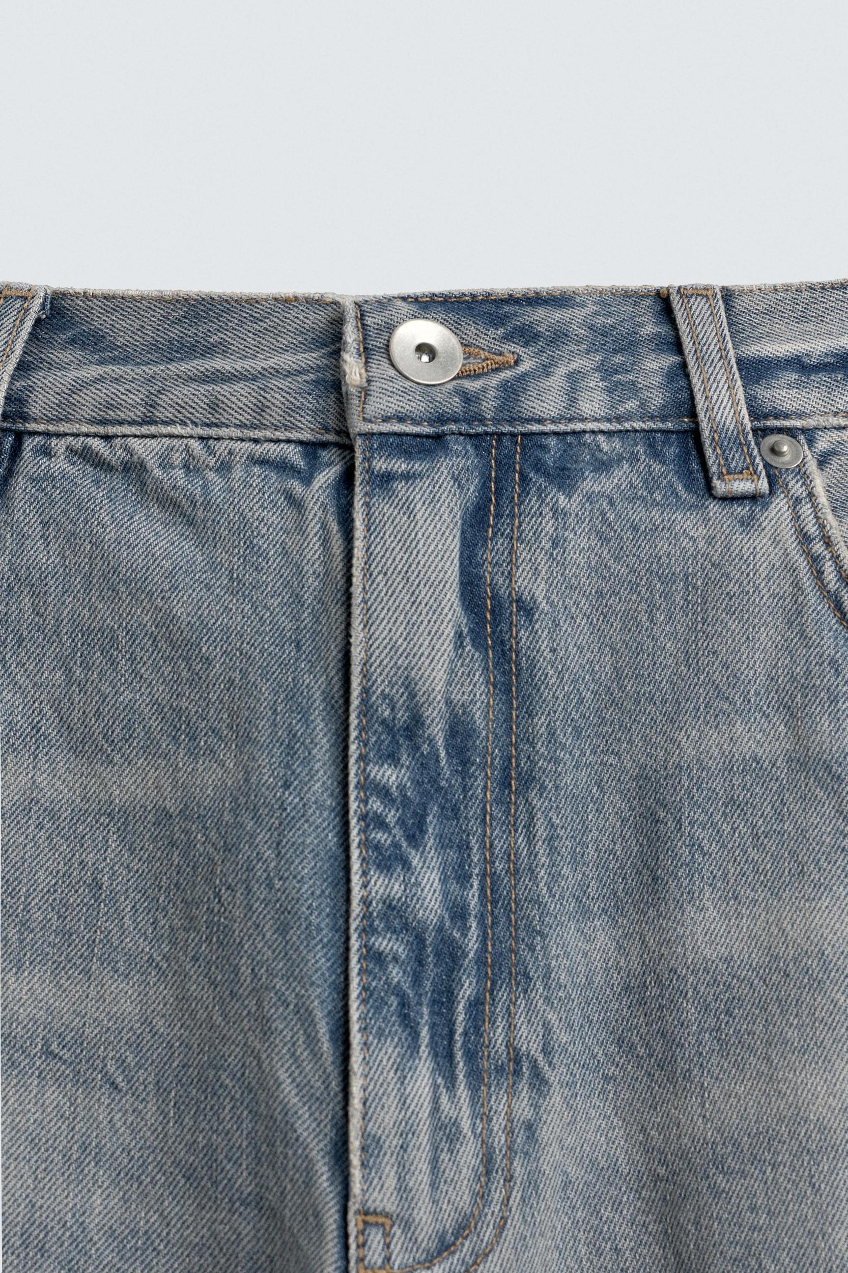 LOOSE FIT RIPPED JEANS Product Image