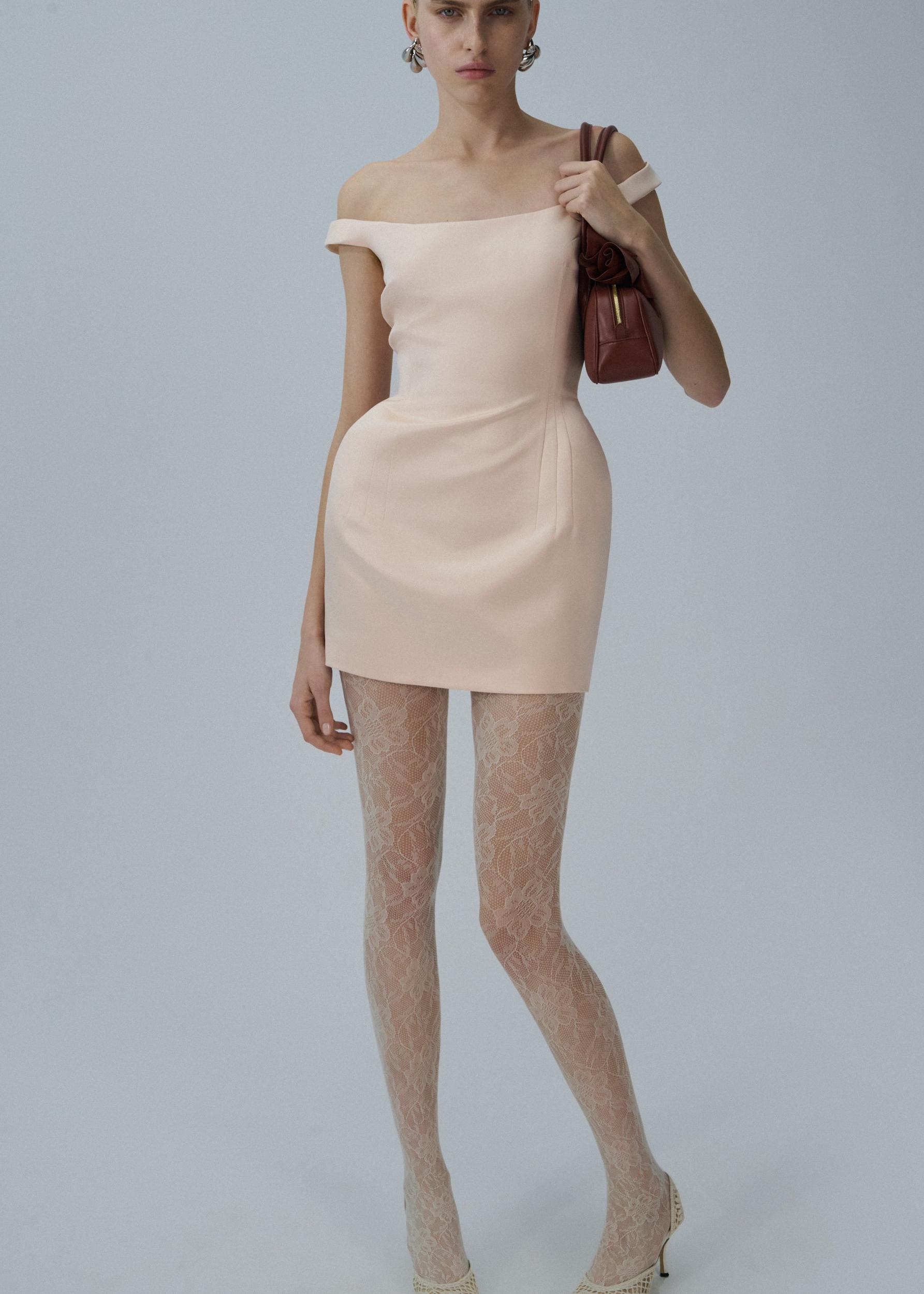 Off-shoulder hip pad mini dress in orange Product Image