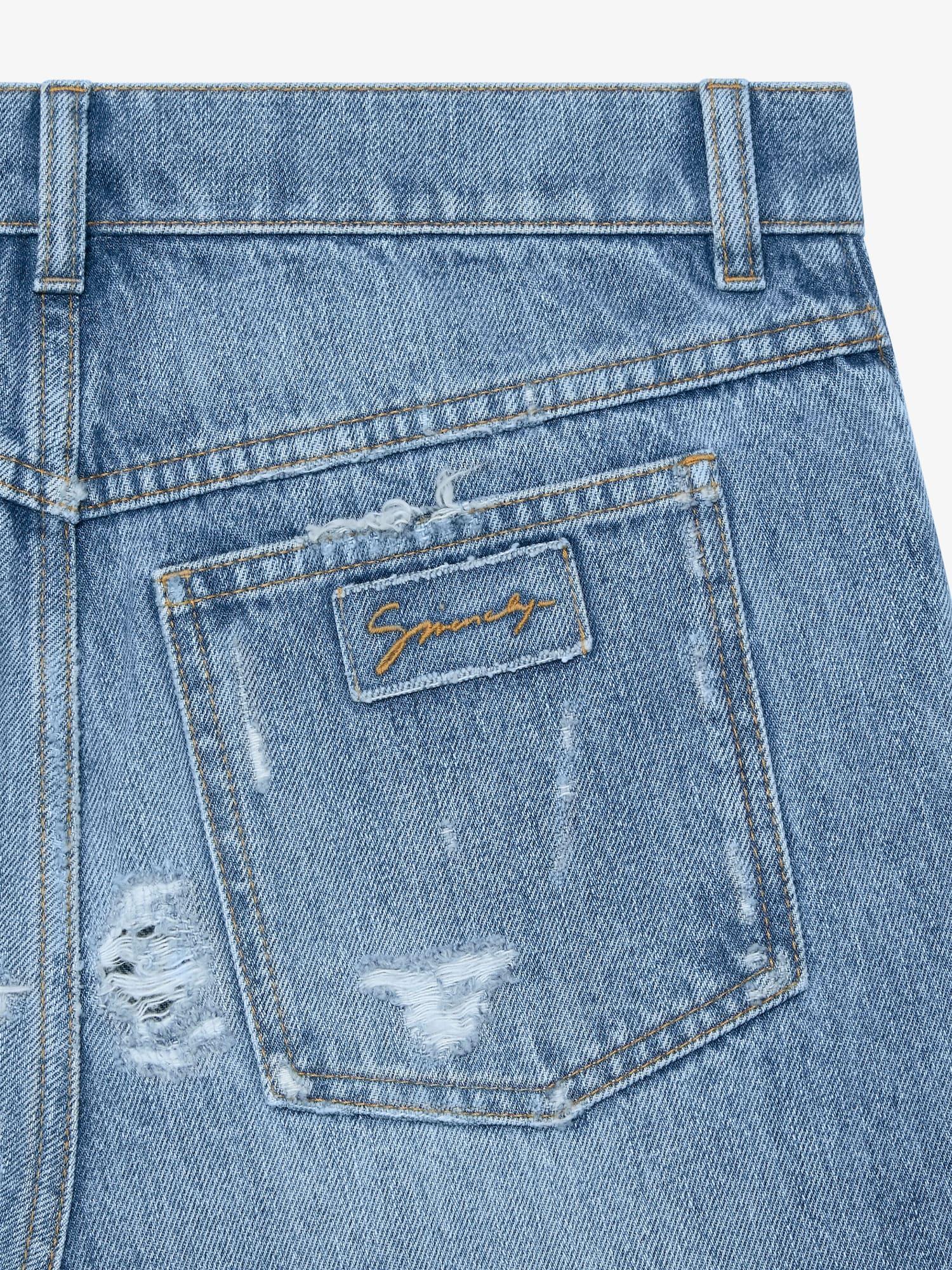 Flare jeans in destroyed denim Product Image