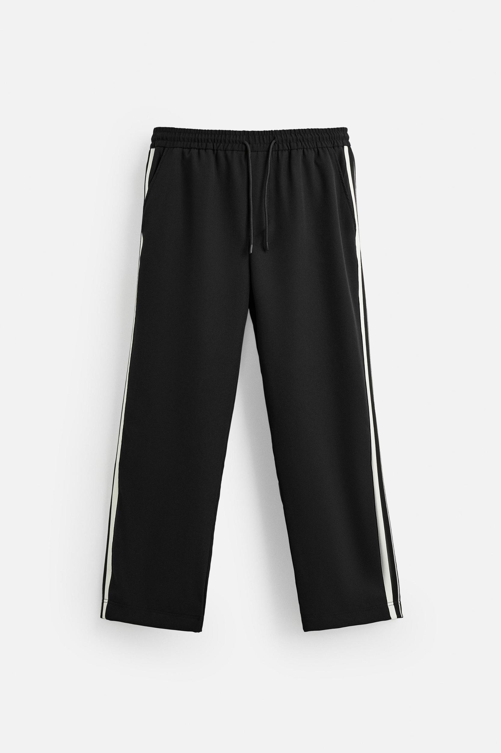 RELAXED FIT PANTS WITH CONTRASTING STRIPES Product Image