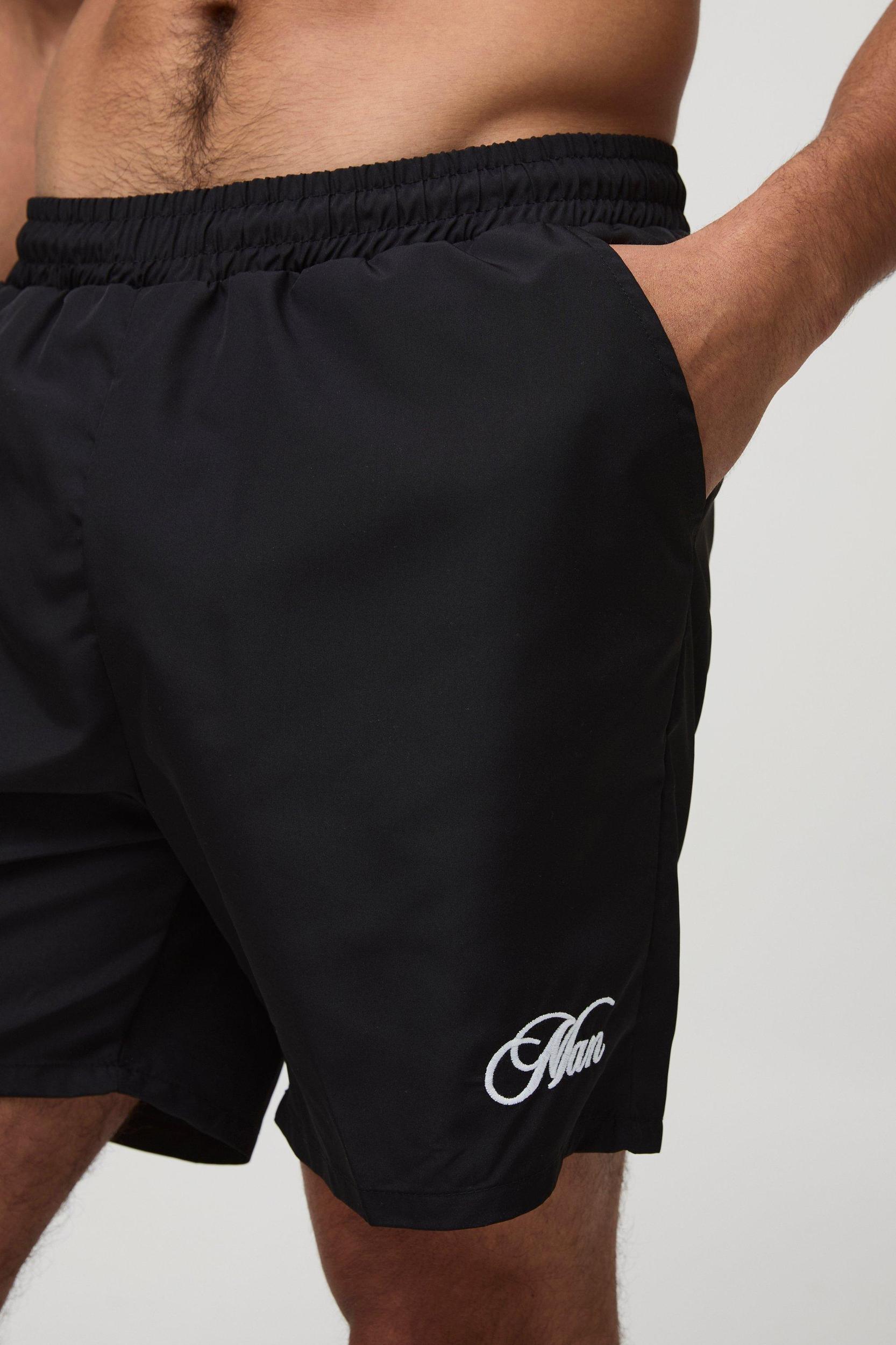 Branded Regular fit Mid length Embroidered Swim Shorts | boohooMAN USA Product Image