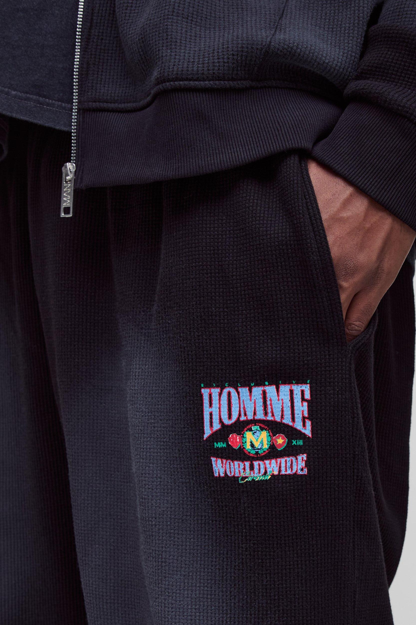 Plus Spray Wash Waffle Graphic Oversized Sweatpants | boohooMAN USA Product Image