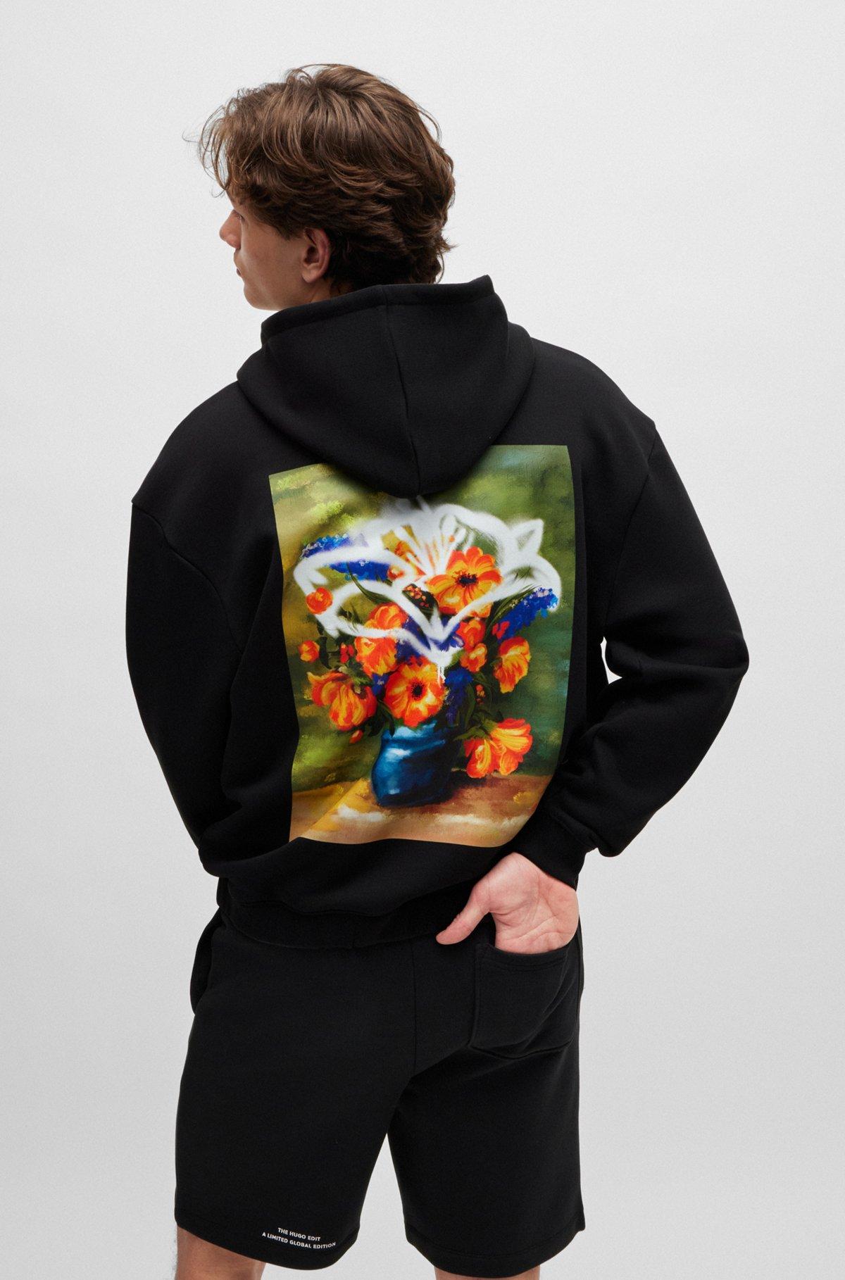 Oversize-fit hoodie with floral artwork Product Image