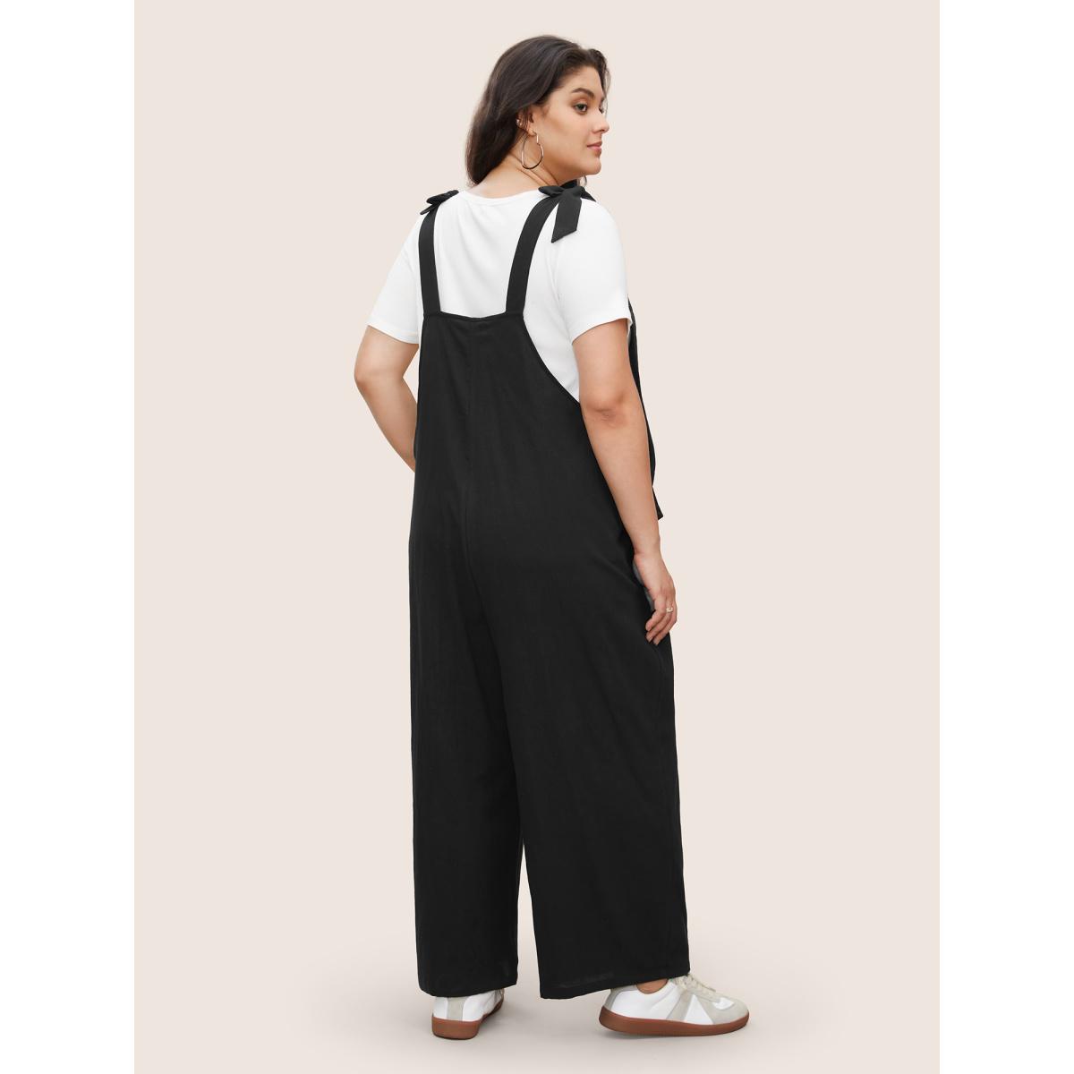 Plus Size Black Solid Pleated Detail Pocket Knotted Shoulder Overall Jumpsuit Women Casual Sleeveless Non Everyday Loose Jumpsuits BloomChic 26/4X Product Image