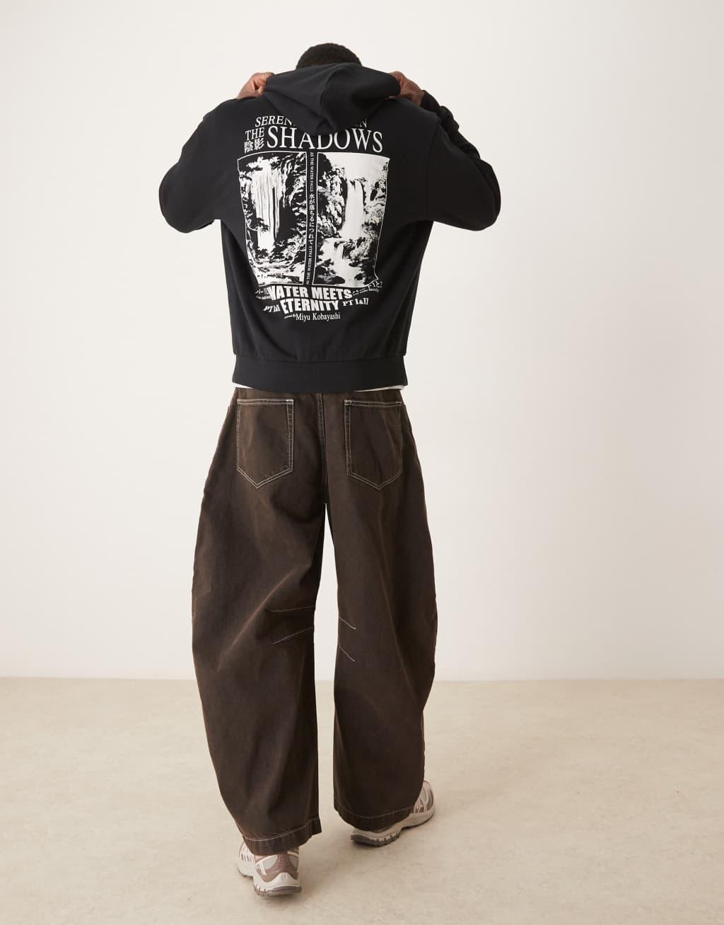 ASOS DESIGN oversized hoodie with monochrome print in black Product Image