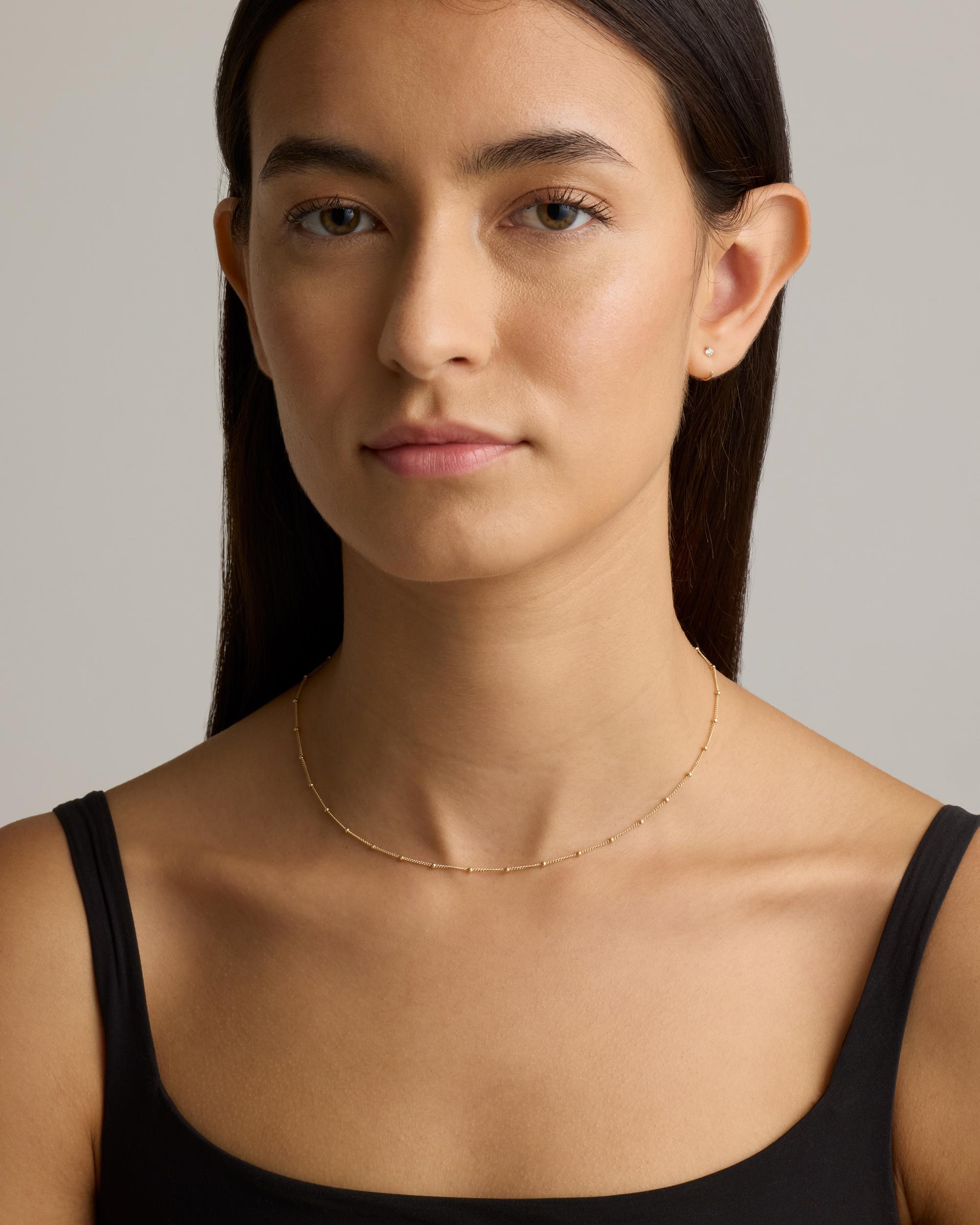 Quince | Women's 14K Gold Diamond Single Open Reverse Huggie Product Image